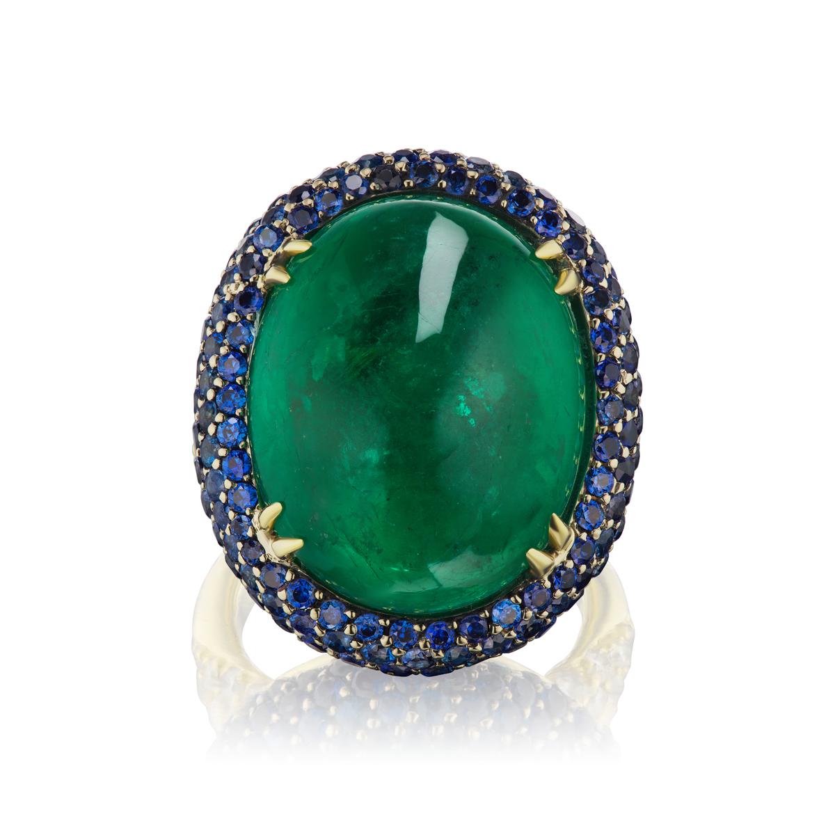 C.Dunaigre certified Brazilian emerald oval cabochon 27.06 cts mount in 18K yellow gold ring with royal blue Blue sapphire and E/VVs diamonds. sapphire is 3.80 cts and diamond is 0.90 cts..
