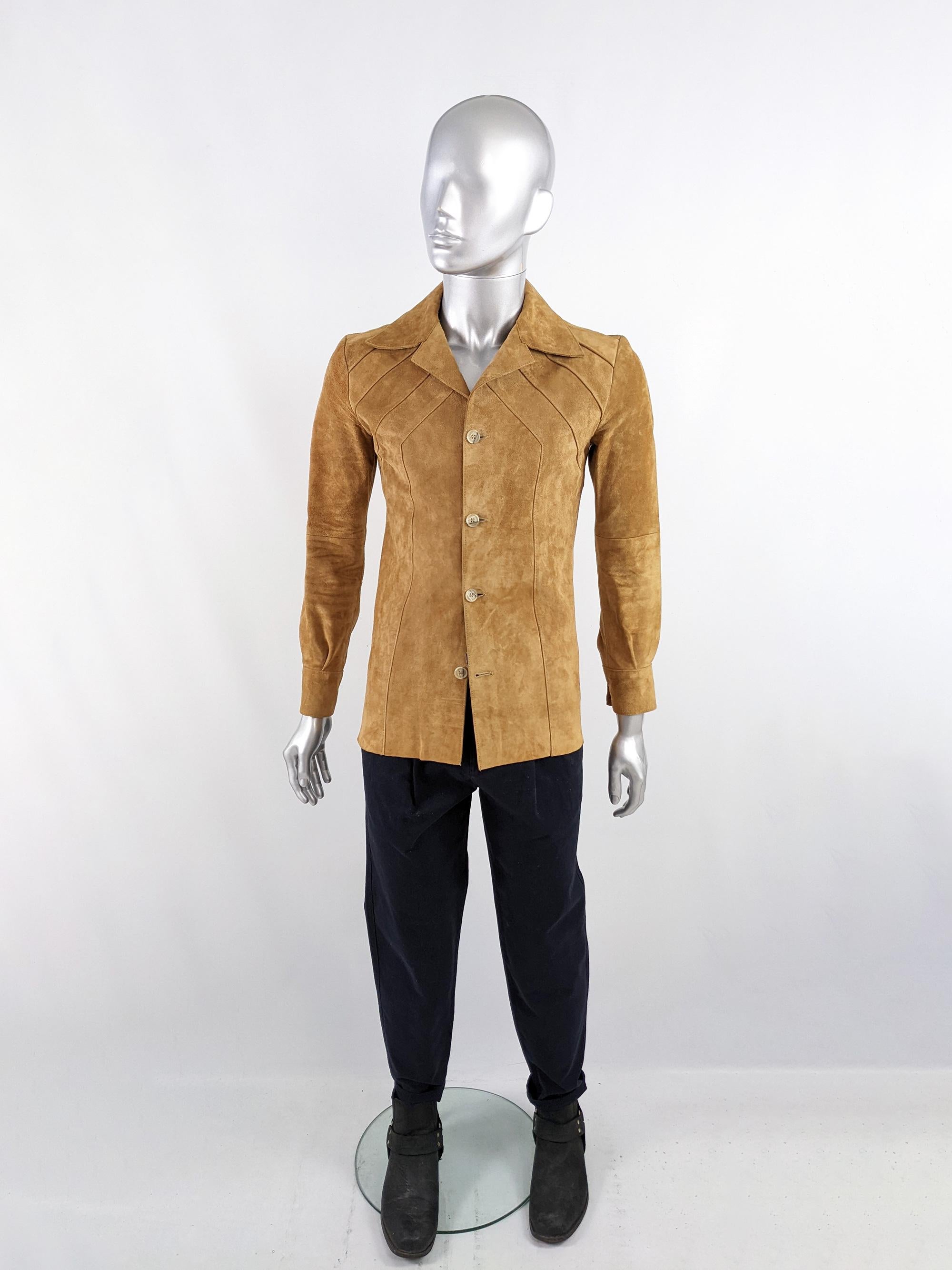 An incredible and rare vintage jacket from the late 60s by iconic Carnaby Street boutique, Take Six. In a tan suede with a large collar, pintuck details on the front and a slim fit for the perfect late 1960s dandy look.

Size: Marked UK 36 but since