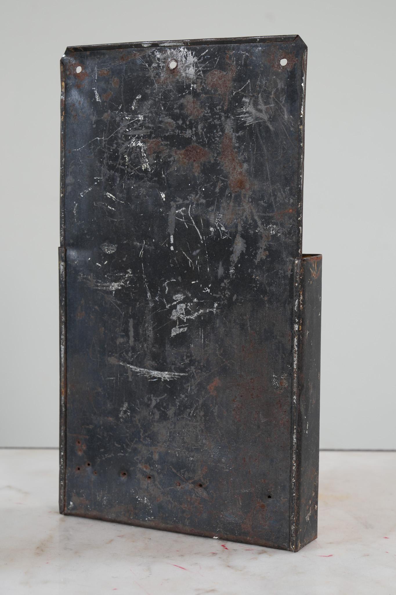 A folded tin “Toleware” leaflet holder naivley sign written for the Green Cattle Stanchion company, Ogensburg, New York State.
