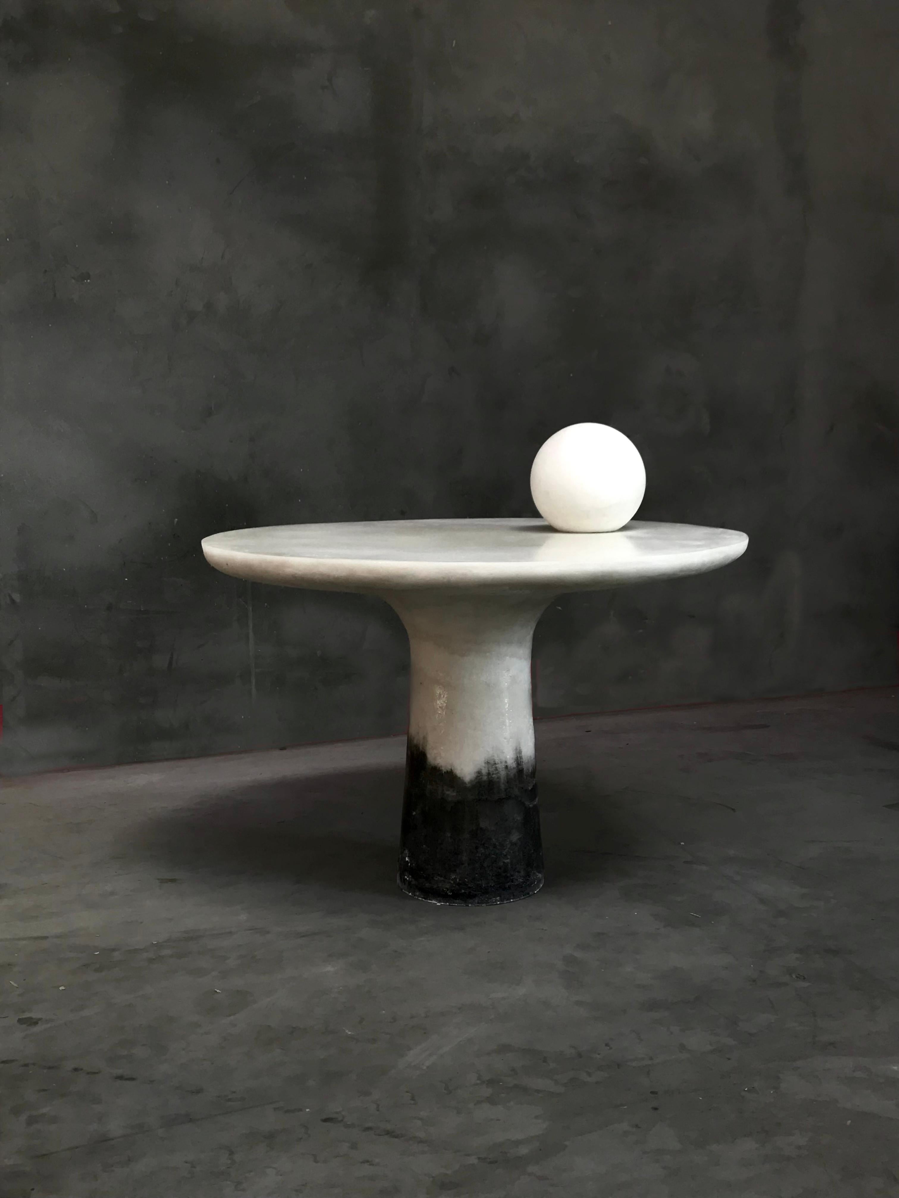 Takotsubo Dining Table by Roxane Lahidji
Dimensions: D 110 x H 75 cm.
Materials: Marble Salt.
Weight: 150 kg.

Roxane Lahidji is a social designer specializing in ecological material developments and applications. Her research focuses on achieving