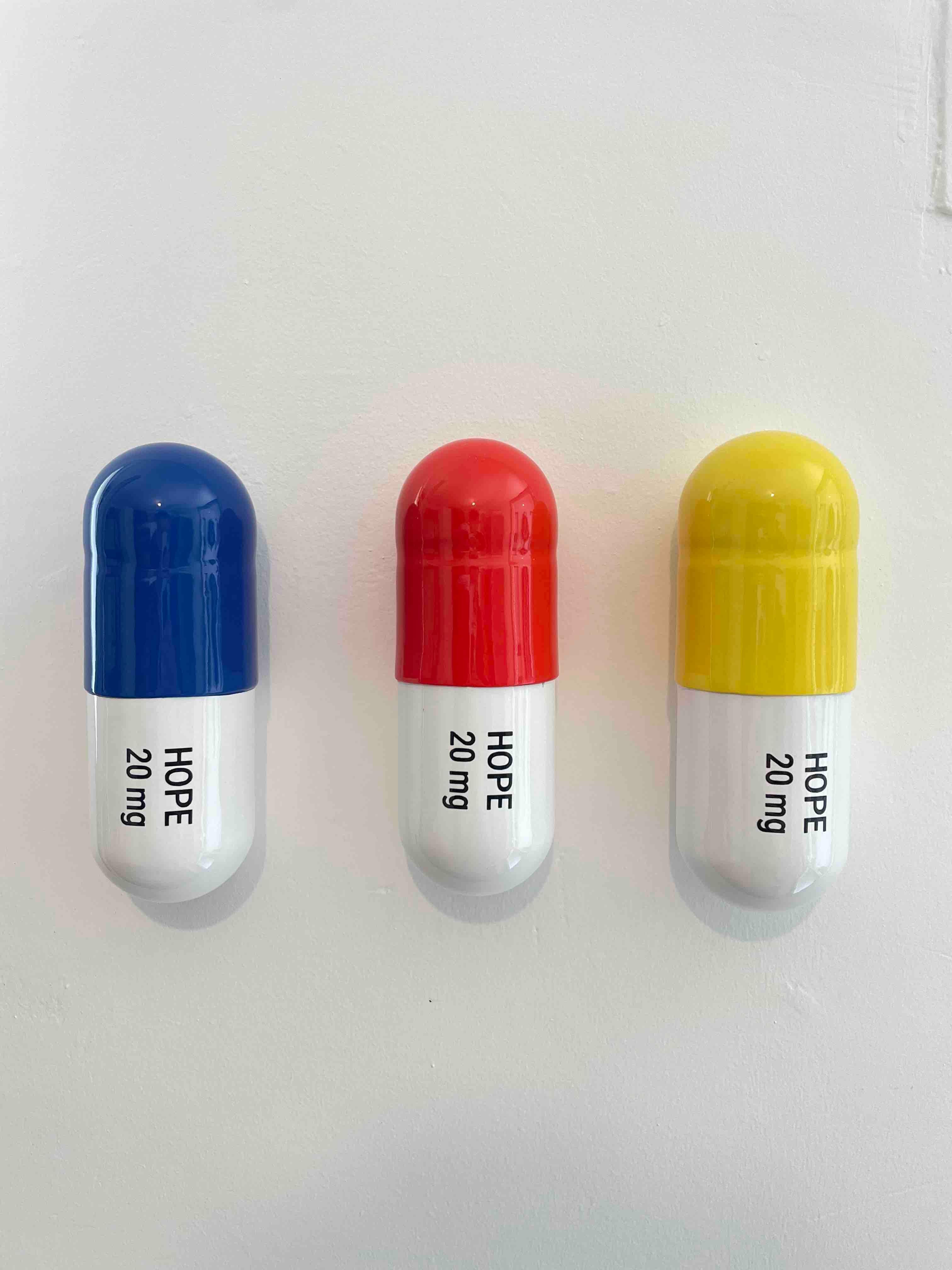 20 MG Hope pill Combo (blue, yellow and orange) - figurative sculpture - Sculpture by Tal Nehoray