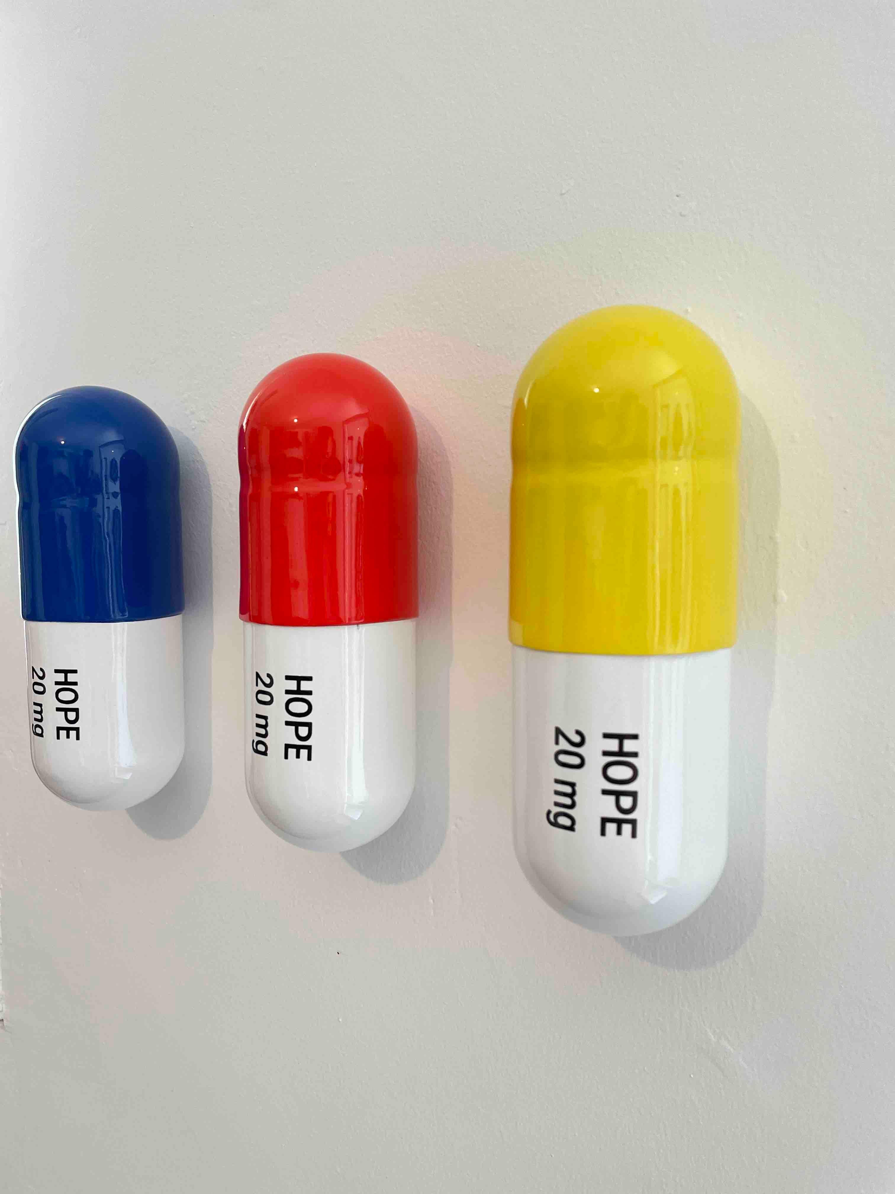 20 MG Hope pill Combo (blue, yellow and orange) - figurative sculpture - Pop Art Sculpture by Tal Nehoray