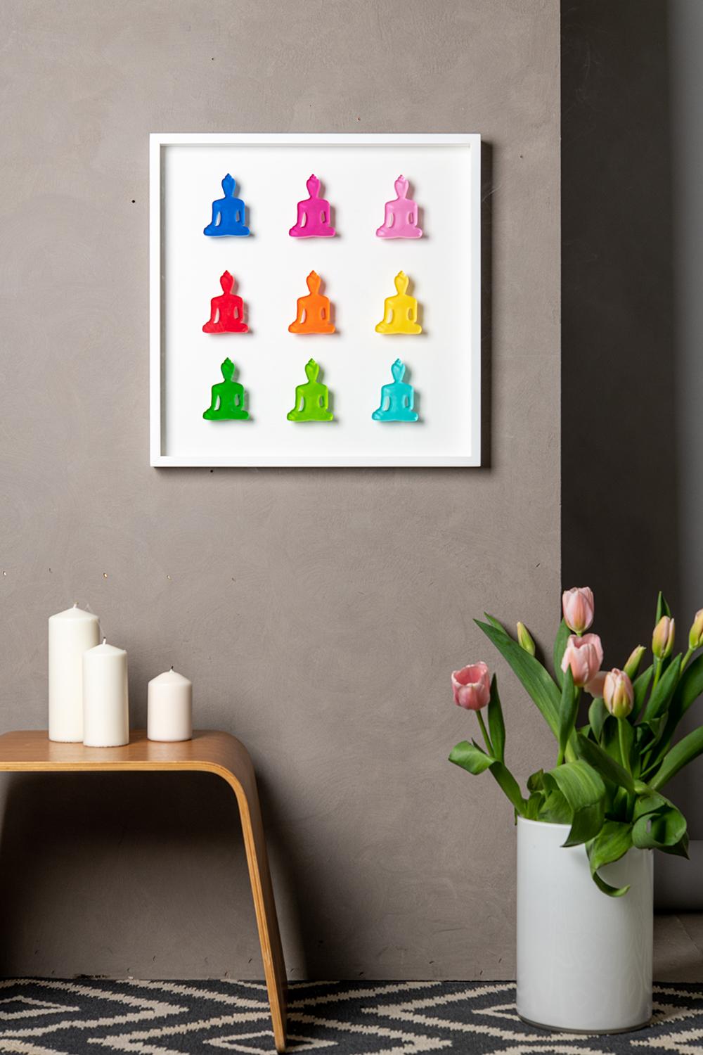 This 3D art piece is made of 9 hand-painted laser-cut Plexiglas pieces that were mounted to an archival foam board backing, framed with a white wooden 2