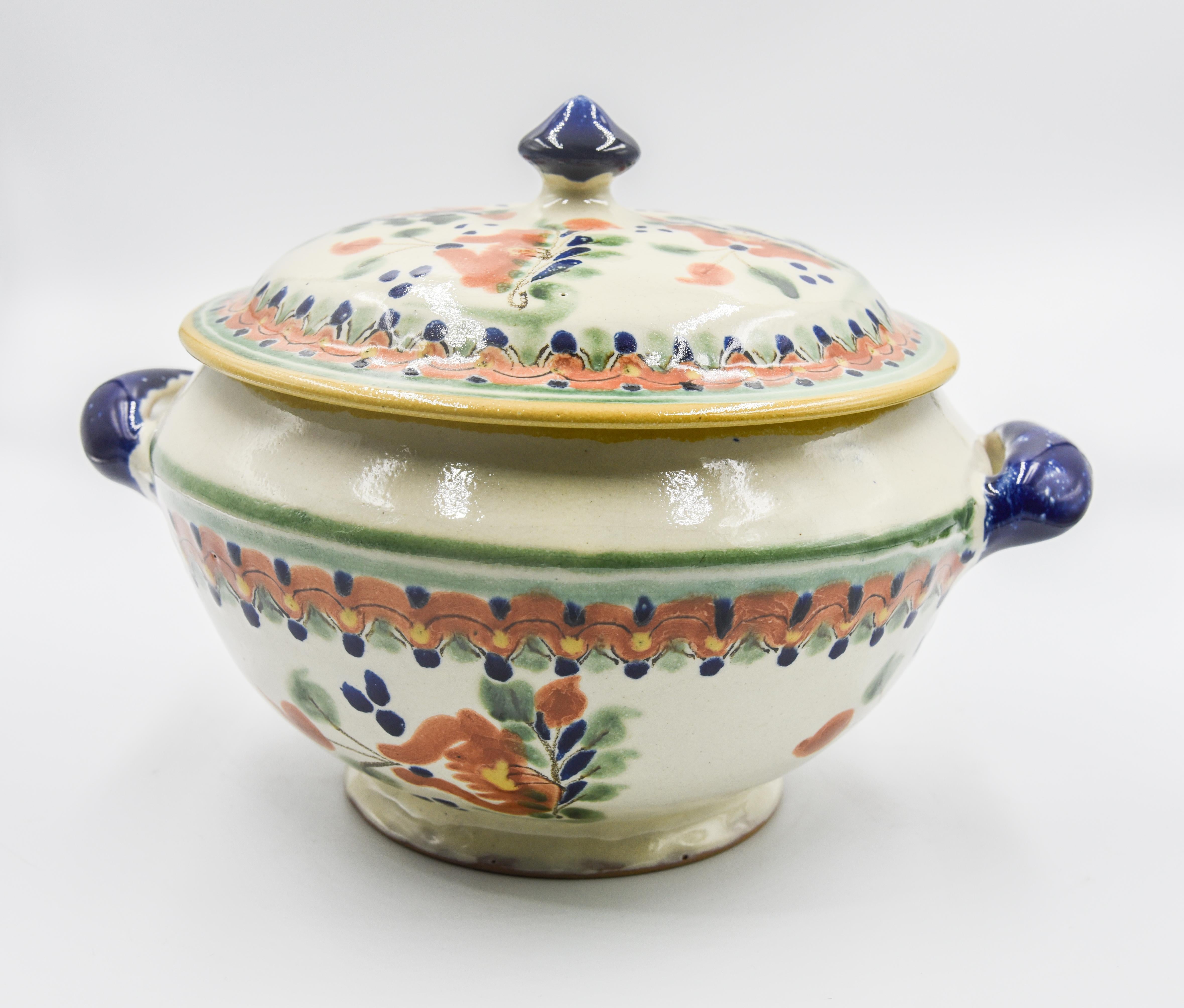 This Majolica Talavera serveware is a contemporary example of Talavera today. Artist Cesar Torres unmasks the past and portraits the present in a soup tureen -- rustic Mexican Hacienda elegance. Perfect for rustic kitchen decoration or utilitarian