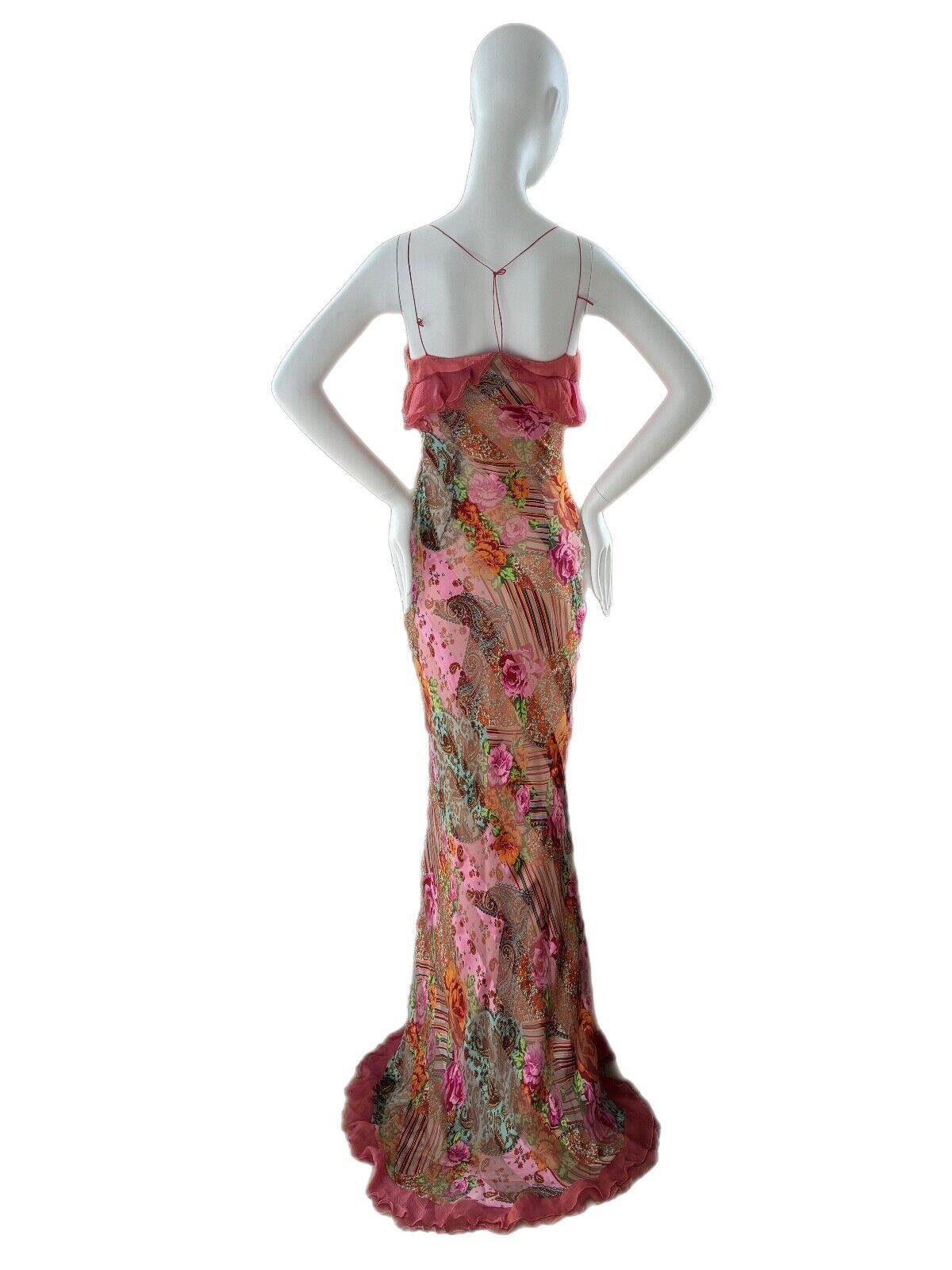 Talbot Runhof
Vintage
NWT's
100% silk
German size 38 
Gorgeous!!! Simply stunning one-of-a-kind vintage gown by Talbot Runhof. Definitely a showstopper and has such effortless movement when gliding through a room. Y2K

Measurements in inches: pit to