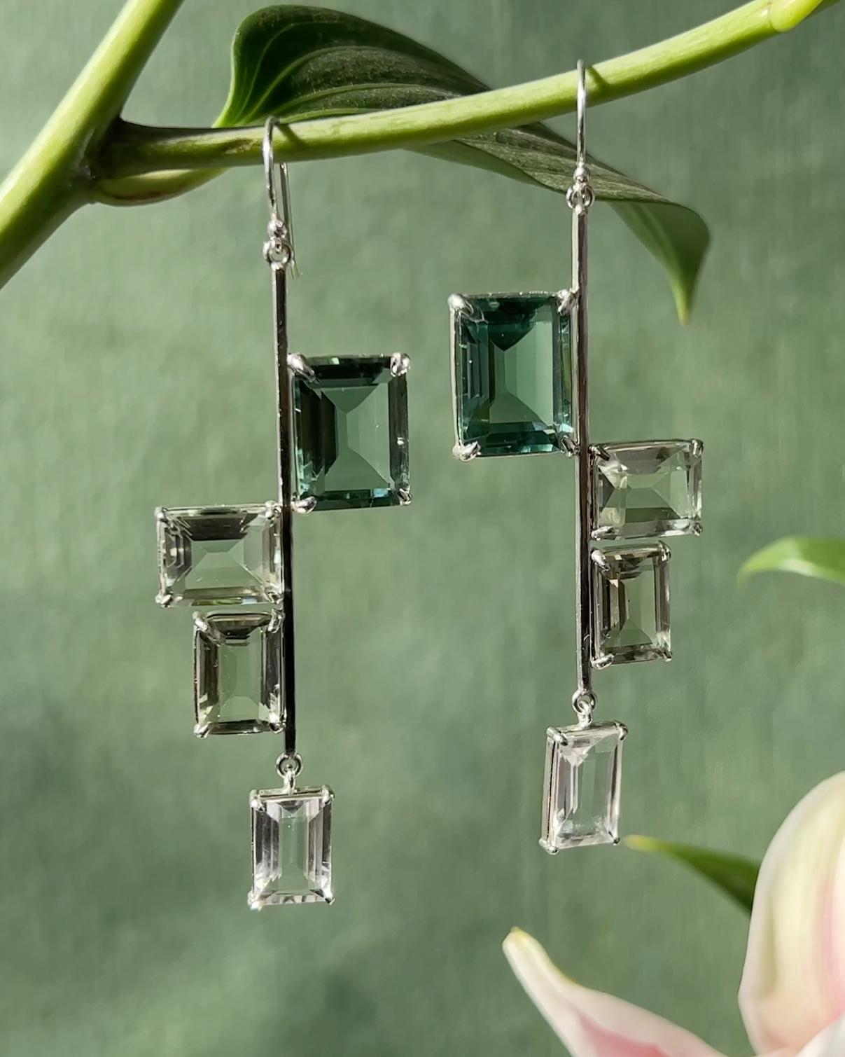 Intention: Make it look easy

Design: A deceptively complex design, the Talia earrings are for people who do it all and make it look easy. An ombre of large emerald-cut green quartz, and smaller prasiolite and white topaz against an anchored