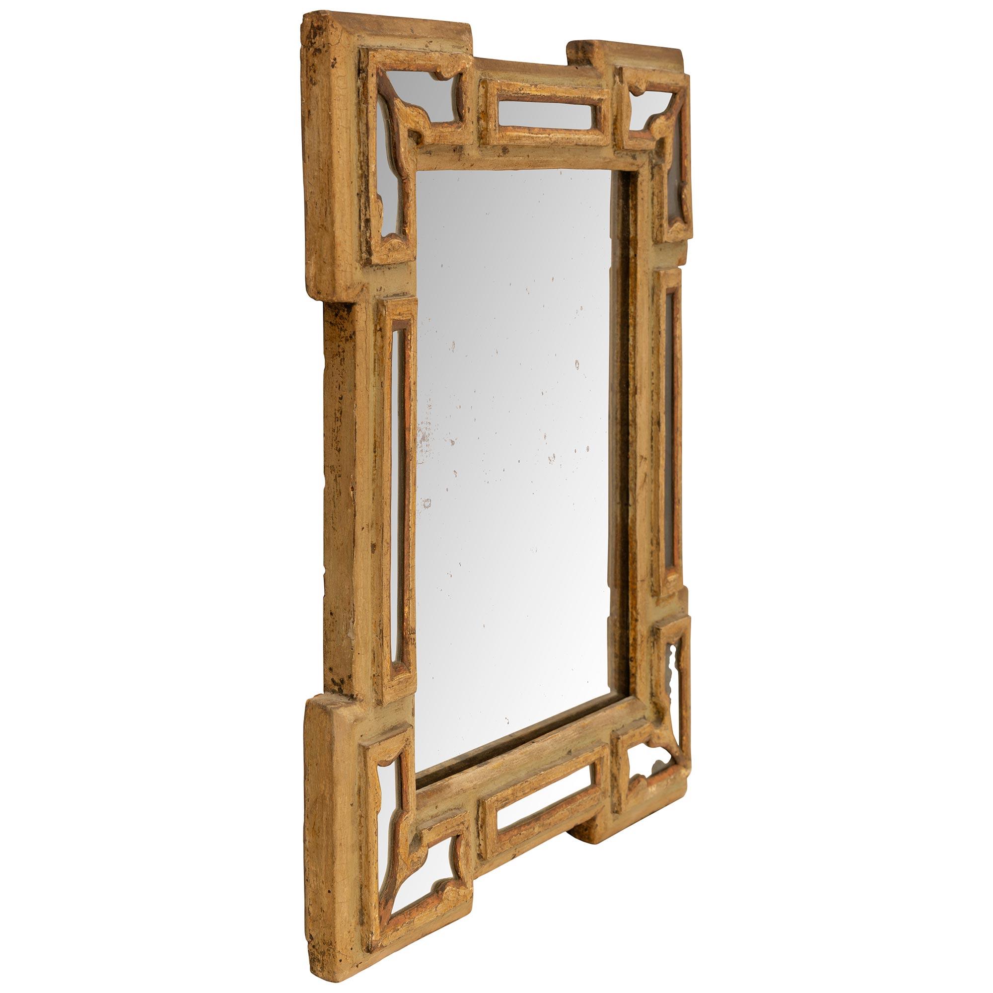 Italian talian 18th Century Baroque St. Double Frame Patinated Wood And Gilt Mirror For Sale