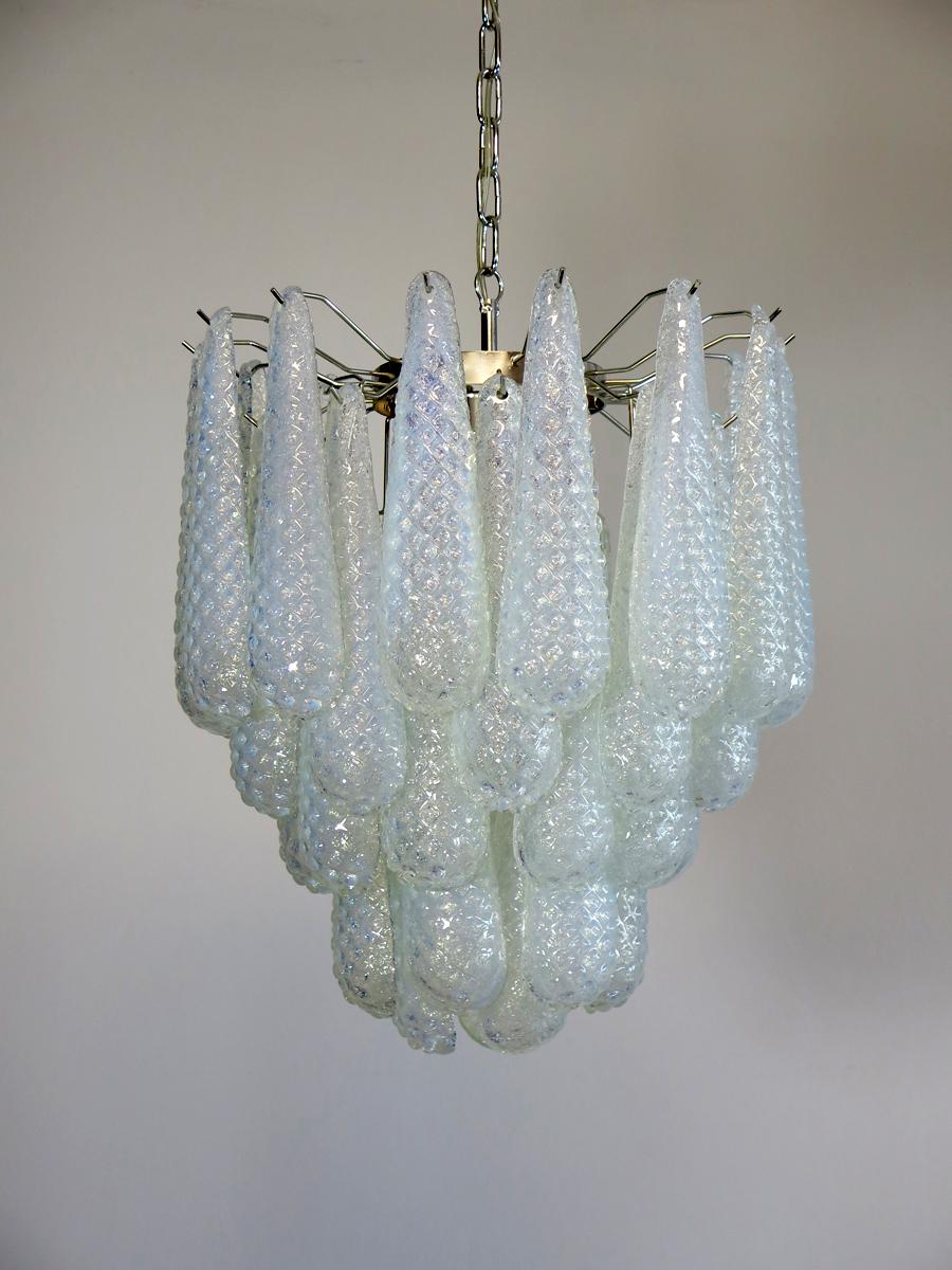 Huge Italian vintage Murano chandelier made by 41 glass petals. The originality of this chandelier is given by the glass, wonderful works of art in opal glass, white inside and with transparent blue reflections on the outside. The glasses are very