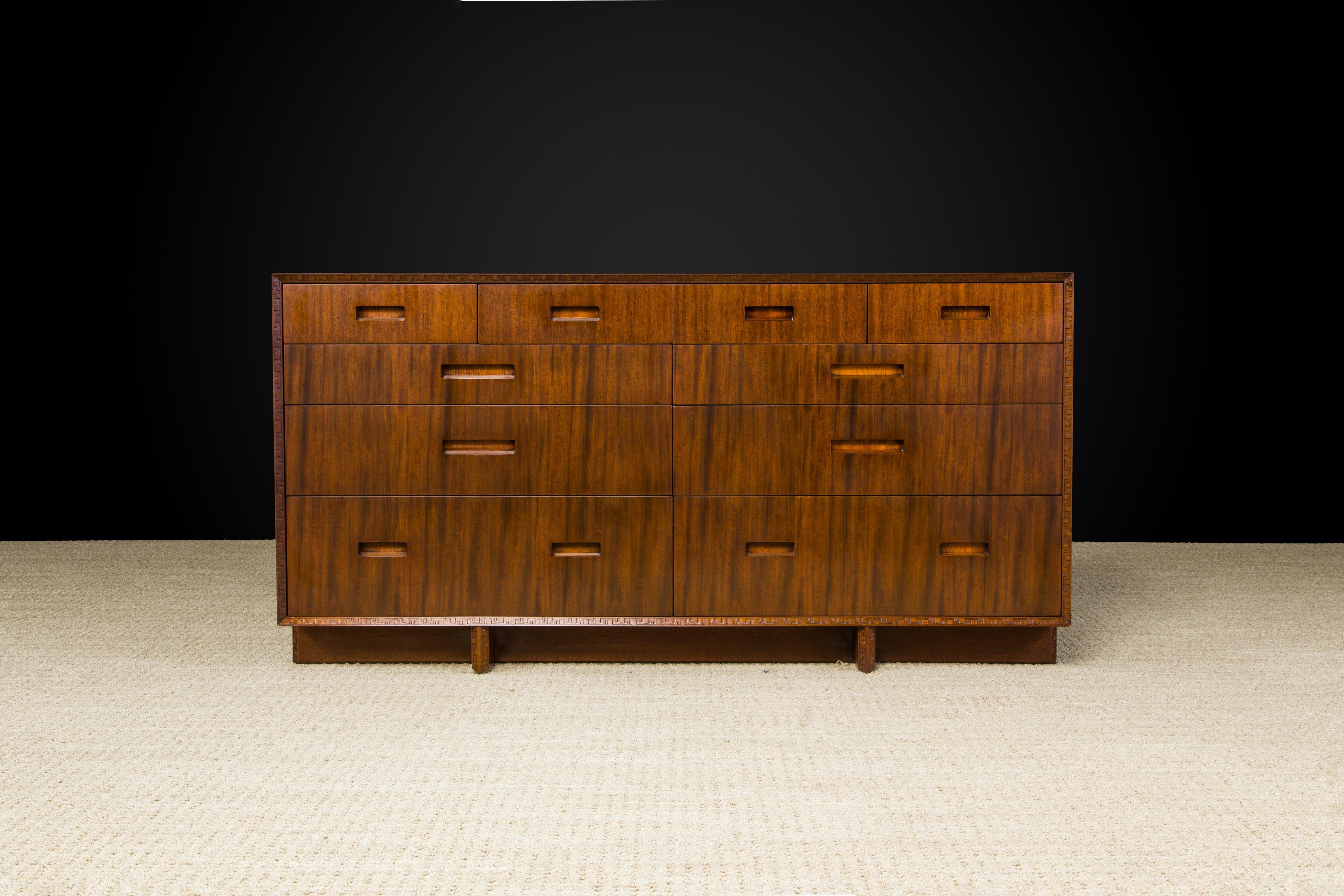This gorgeously refinished Honduran Mahogany 'Taliesin' sideboard was designed by Frank Lloyd Wright for Heritage-Henredon in 1955 and produced only for two years, therefore is now a highly sought-after and rare collectors item. This example is