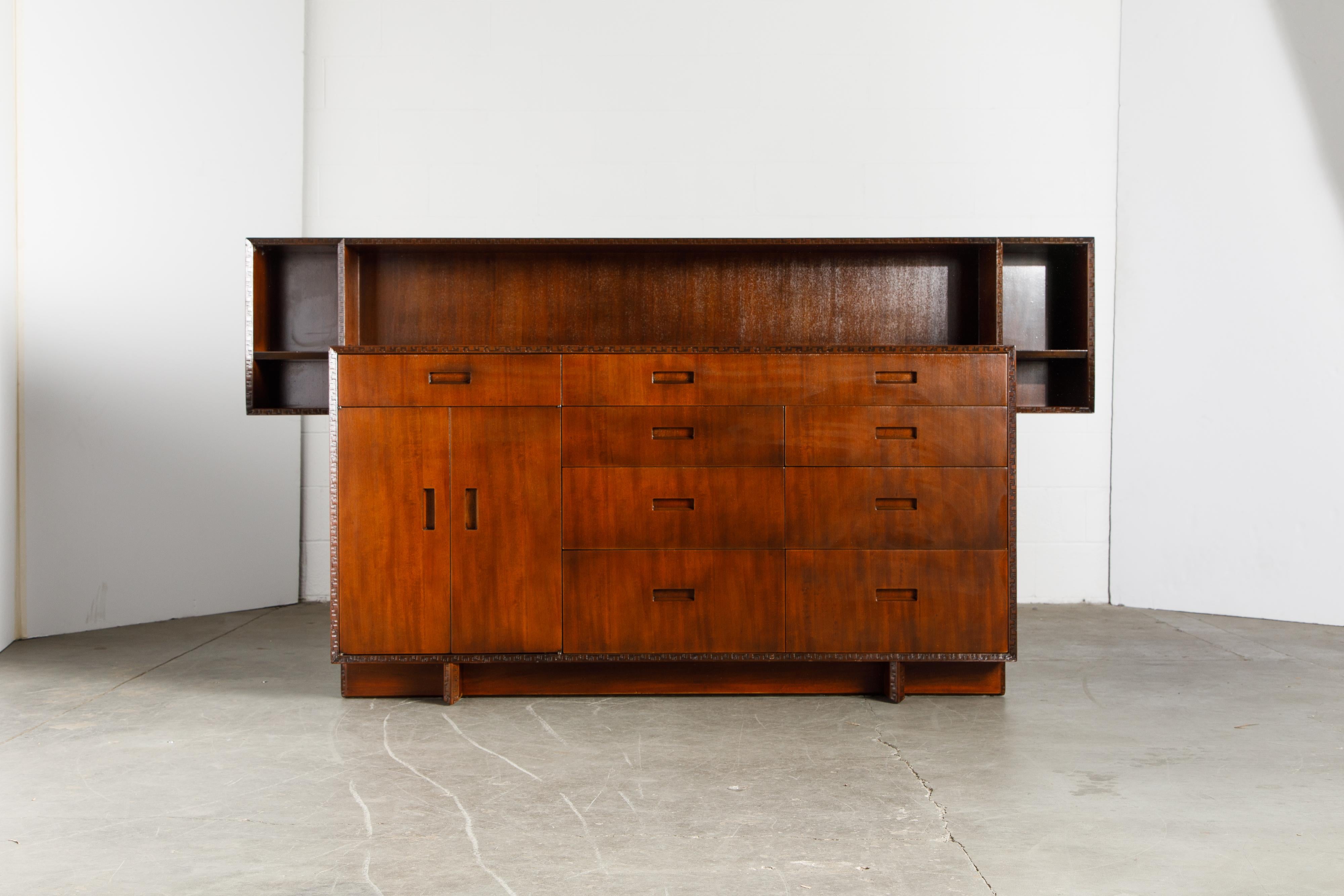 This rare and gorgeously refinished Honduran Mahogany 'Taliesin' sideboard with removable gallery deck was designed by Frank Lloyd Wright for Heritage-Henredon in 1955 and produced only for two years, therefore is now a highly sought-after and rare