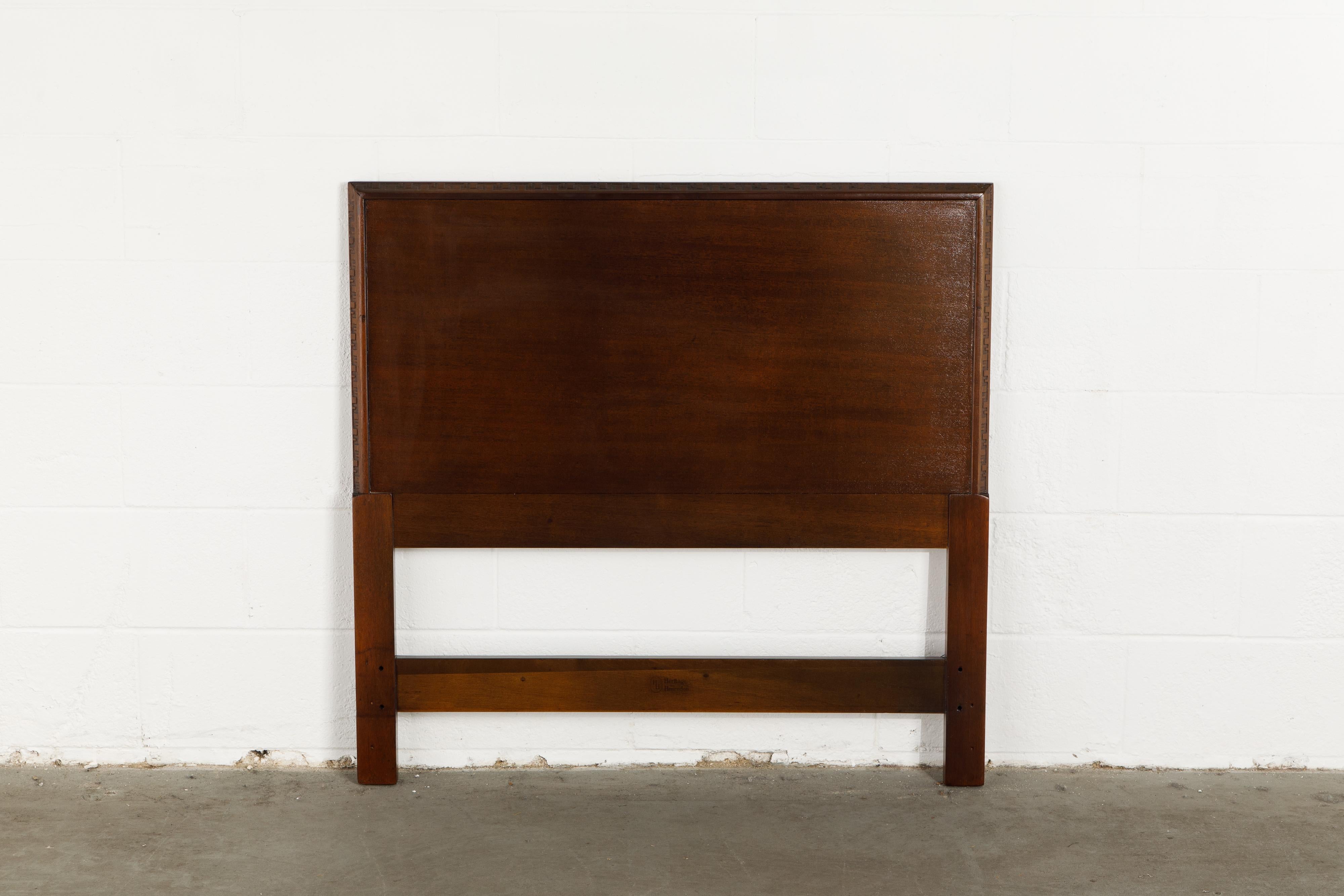 This gorgeously refinished Honduran Mahogany 'Taliesin' Collection headboard for a twin sized bed was designed by Frank Lloyd Wright for Heritage-Henredon in 1955 and produced only for two years, therefore is now a highly sought-after and rare