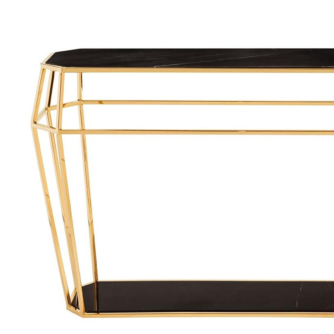 Console table Talisma marble with metal
structure in gold finish, with black marble tops.
Also available with structure in copper finish with
white marble tops.