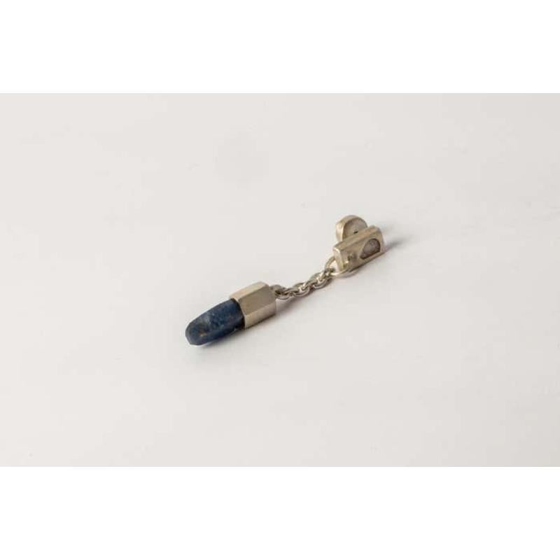 Dangle earring in sterling silver and a slab of rough diamond with blue sapphire crystal. This slab is removed from a larger chunk of diamond. This item is made with a naturally occurring element and will vary from the photograph you see. Each piece