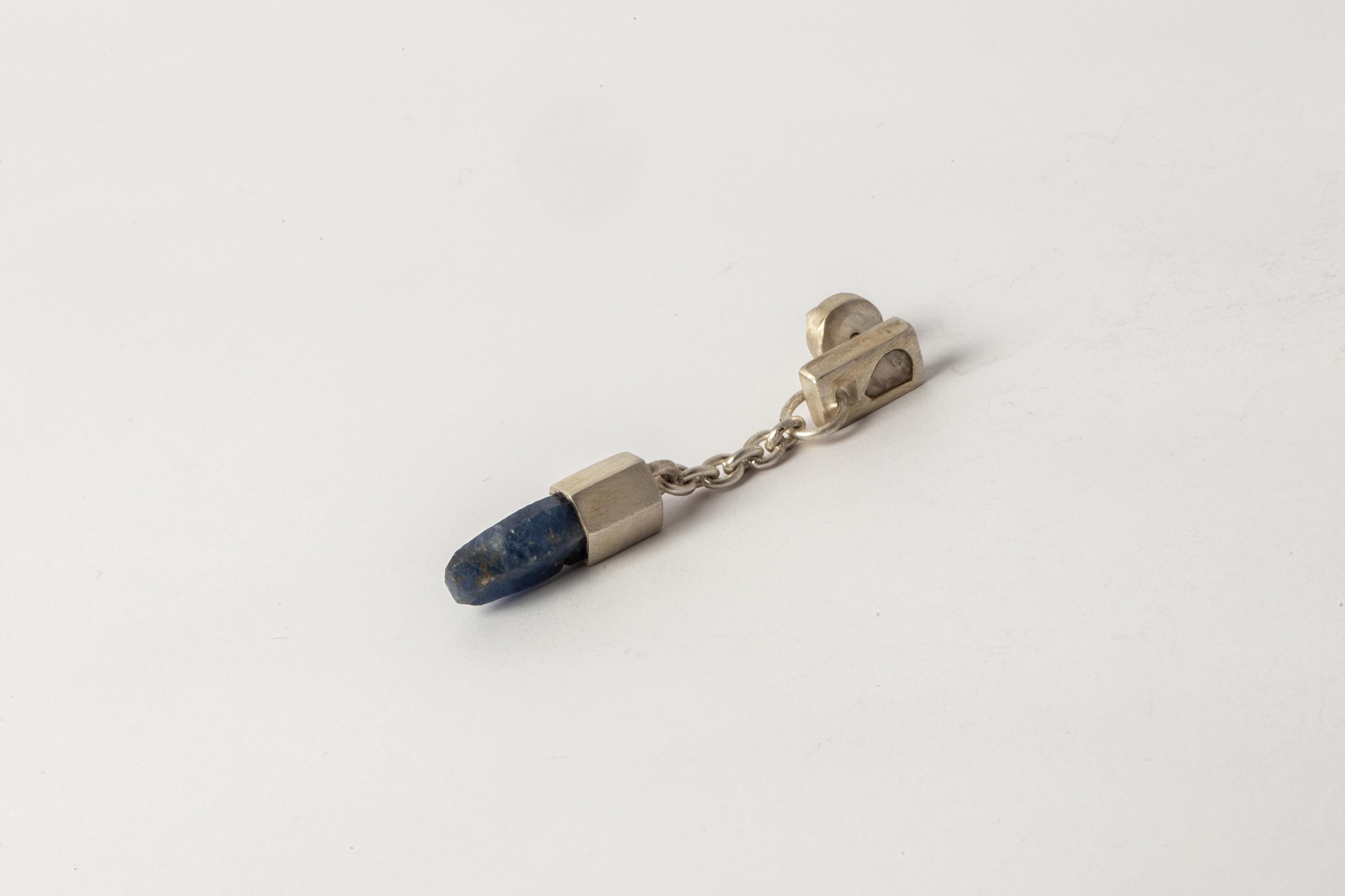 Dangle earring in sterling silver and a slab of rough diamond with blue sapphire crystal. This slab is removed from a larger chunk of diamond. This item is made with a naturally occurring element and will vary from the photograph you see. Each piece