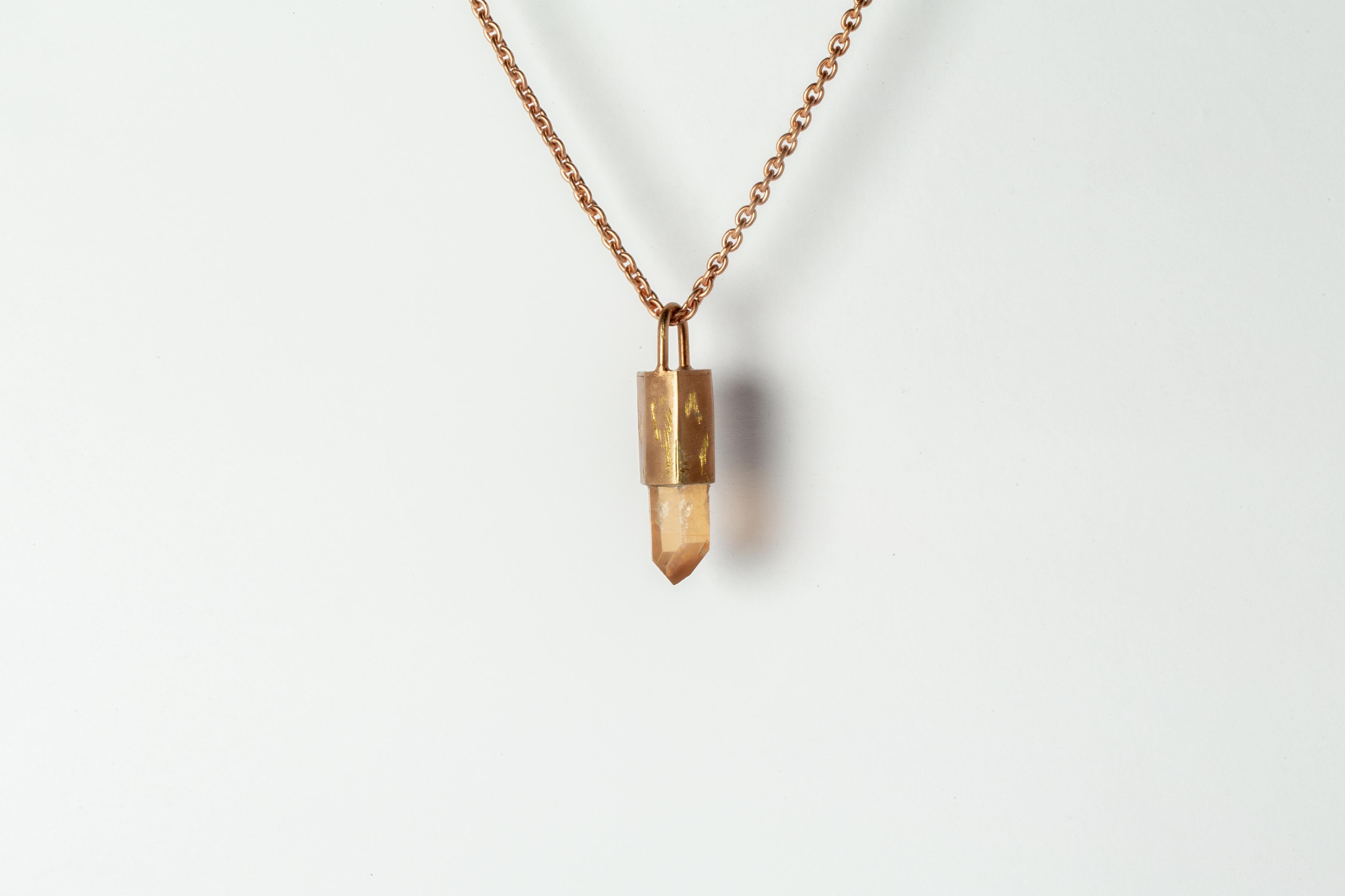Pendant necklace in brass, sterling silver, and a rough of iron quartz. Brass and sterling silver substrates are electroplated with 18k Rose Gold and then dipped into acid to create the subtly destroyed surface. The Talisman series is an exploration