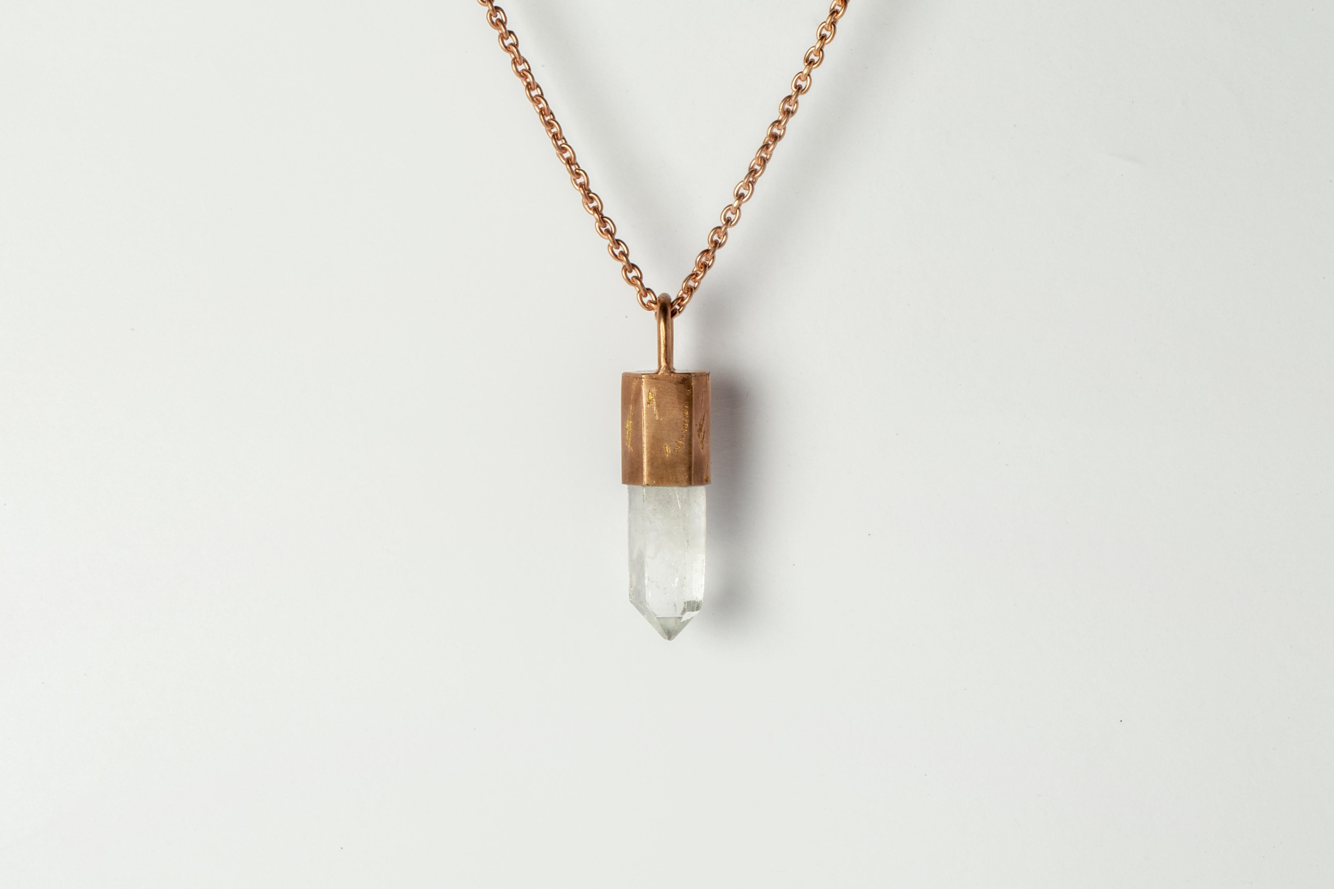 Pendant necklace in brass, sterling silver, and a rough of misc quartz. Brass and sterling silver substrates are electroplated with 18k rose gold and then dipped into acid to create the subtly destroyed surface.
The Talisman series is an exploration