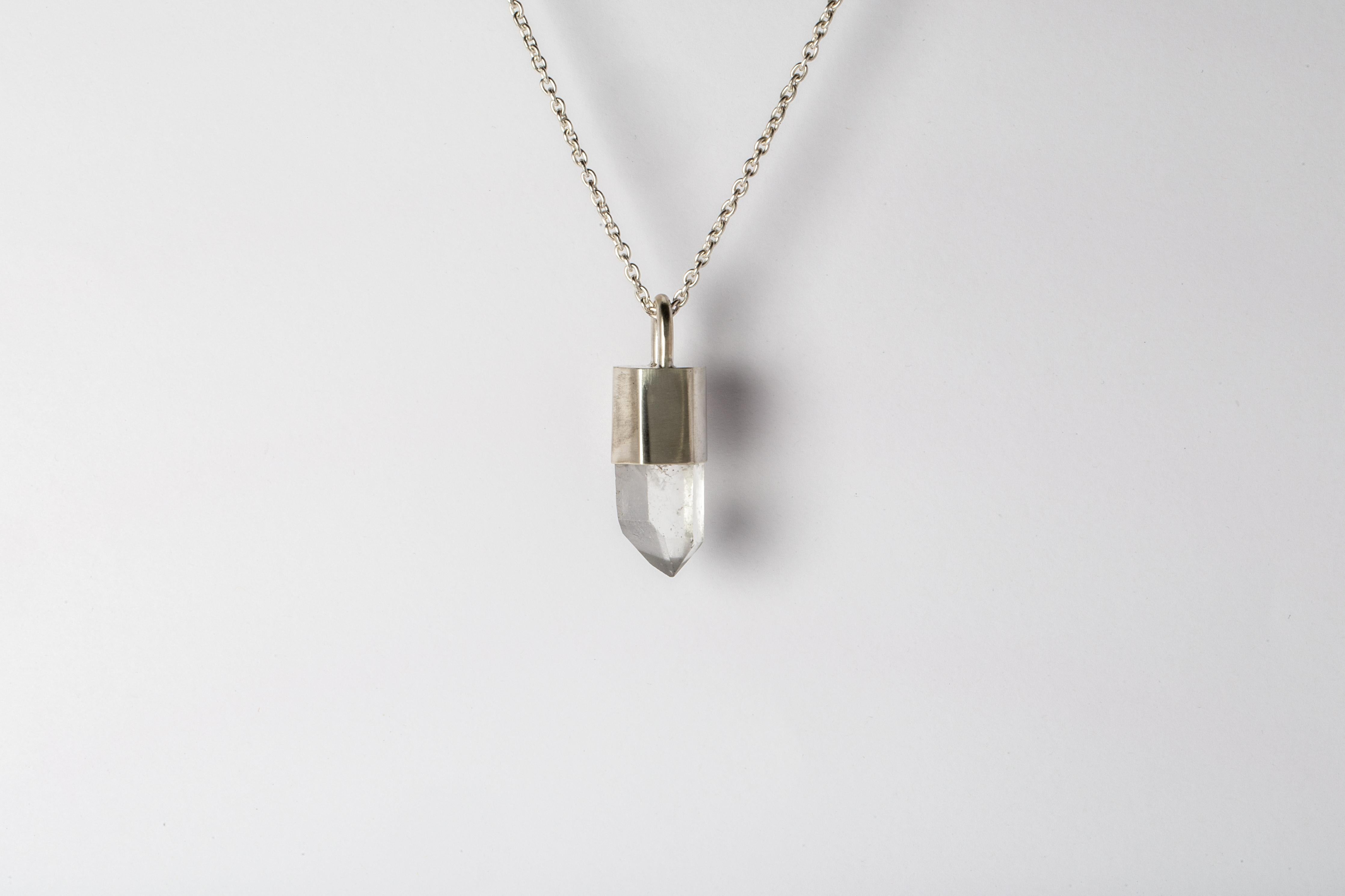 Necklace in matte sterling silver and a rough of misc quartz. It comes on 74 cm sterling silver.
The Talisman series is an exploration into the power of natural crystals. The crystals used in these pieces are discovered through adventure and are