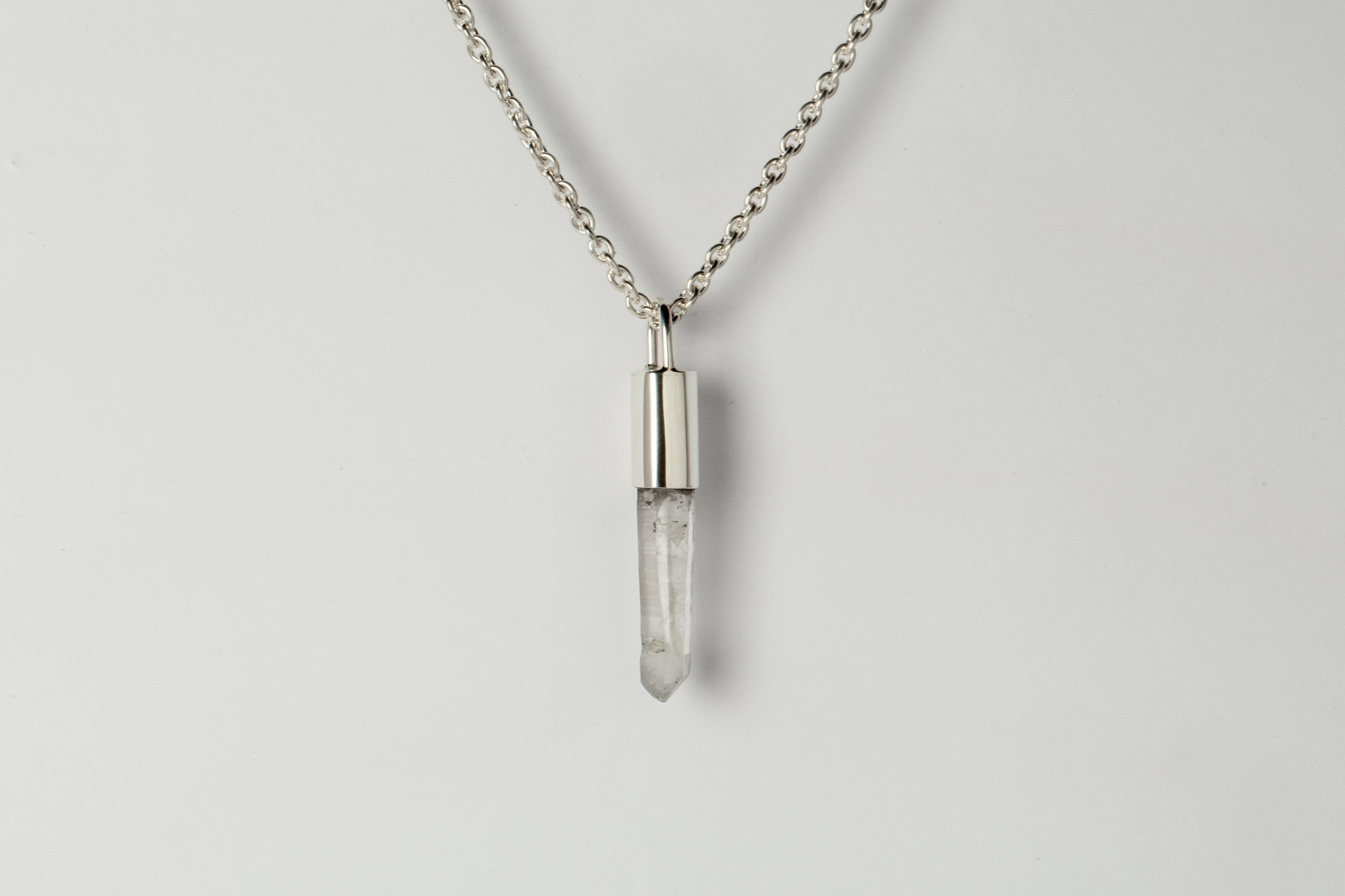 Pendant necklace in polished sterling silver and a rough of Misc Quartz. It comes on 74 cm sterling silver chain.

The Talisman series is an exploration into the power of natural crystals. The crystals used in these pieces are discovered through