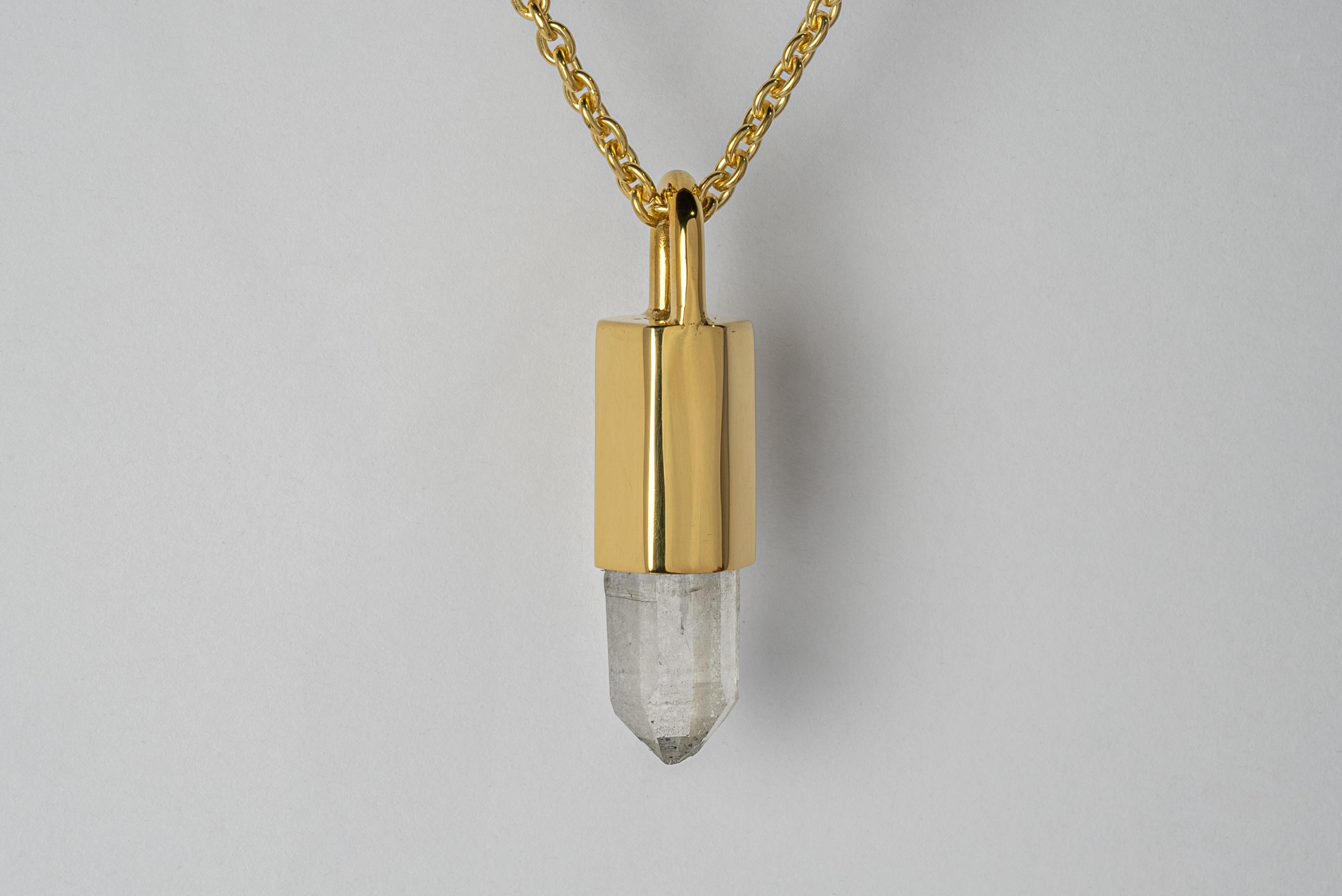 Pendant necklace in brass, sterling silver, and a rough of misc quartz. Brass and sterling silver are substrates, polished, and electroplated with 18k gold and then dipped into acid to create the subtly destroyed surface.
The Talisman series is an