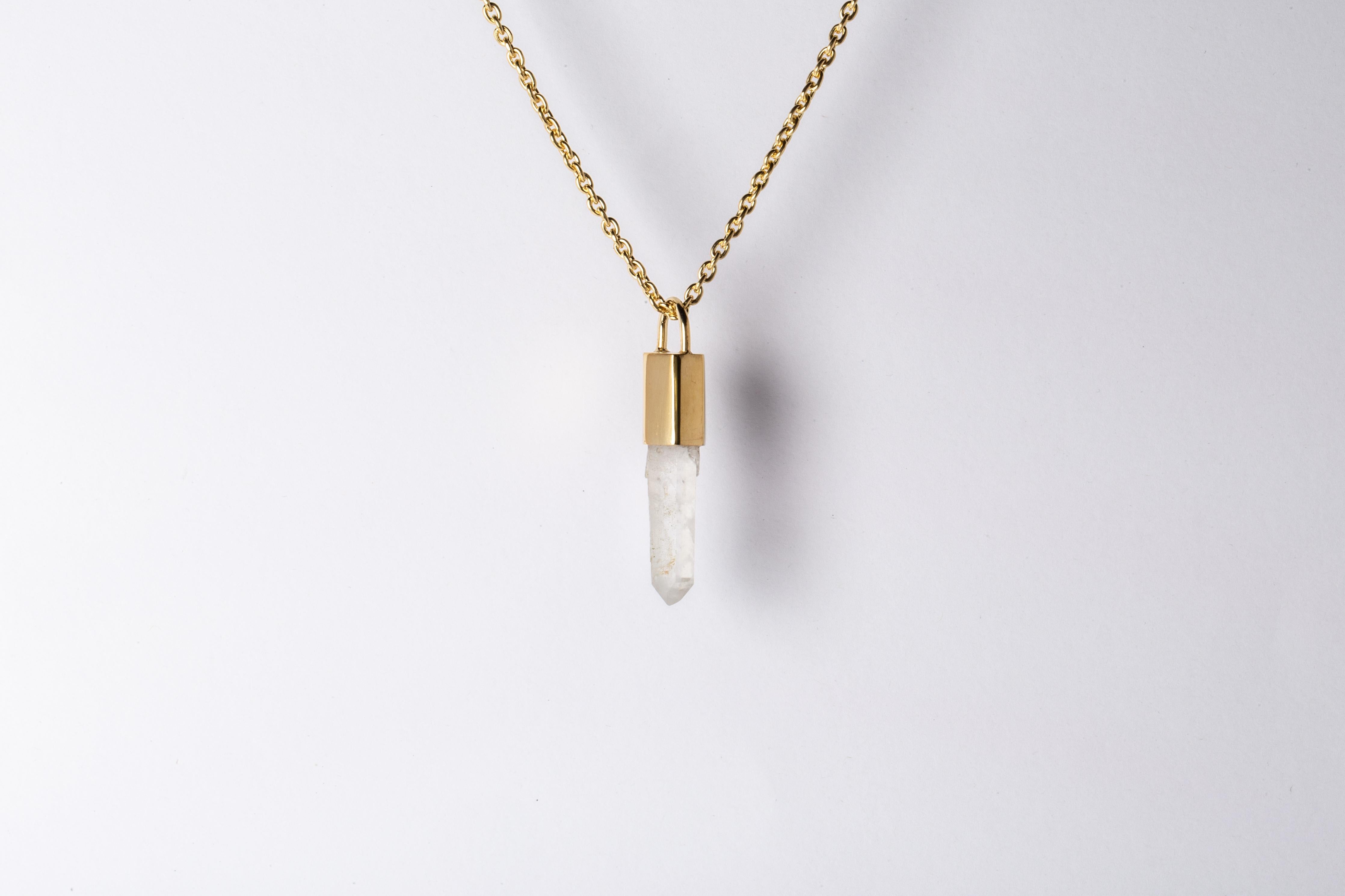 Pendant necklace in brass, sterling silver, and a rough of misc quartz. Brass and sterling silver are substrates, polished, and electroplated with 18k gold. It comes on 74 cm stelring silver chain.
The Talisman series is an exploration into the