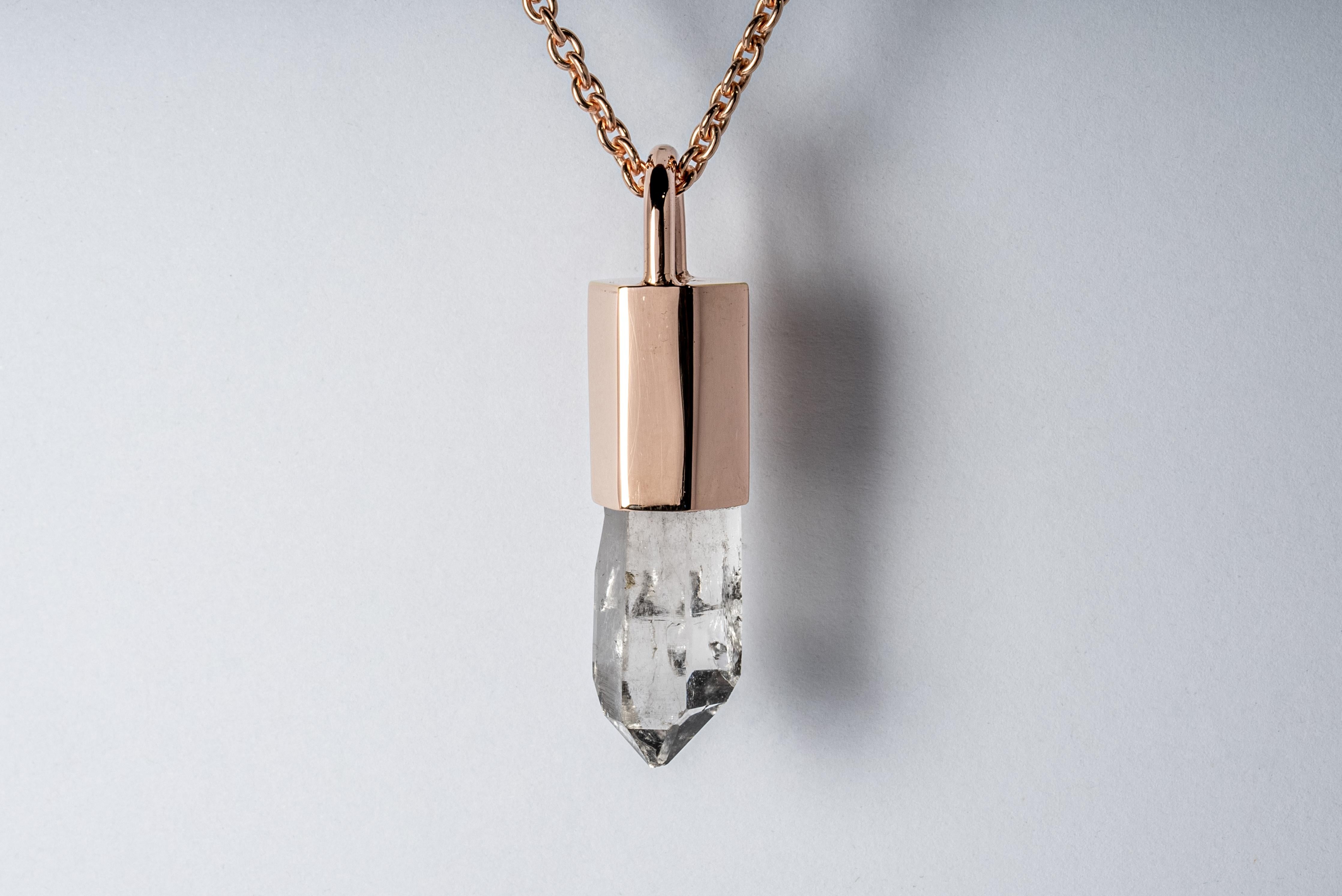 Pendant necklace in brass, sterling silver, and a rough of misc quartz. Brass and sterling silver substrates are electroplated with 18k rose gold and then dipped into acid to create the subtly destroyed surface.
The Talisman series is an exploration