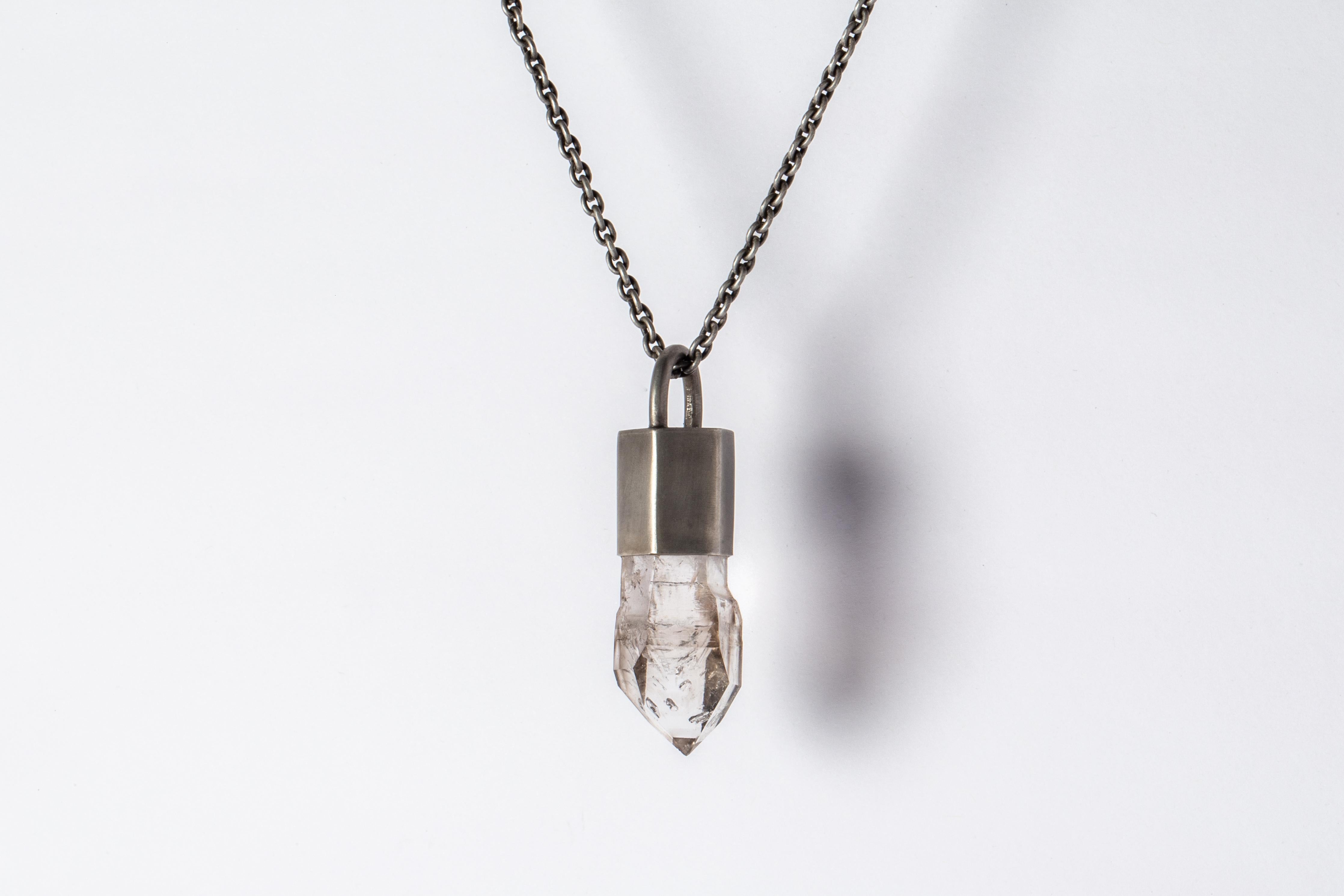 Talisman necklace in dirty sterling silver and a rough of enhydro quartz. Sterling silver, dipped in acid to create a subdued surface. The Talisman series is an exploration into the power of natural crystals. The crystals used in these pieces are