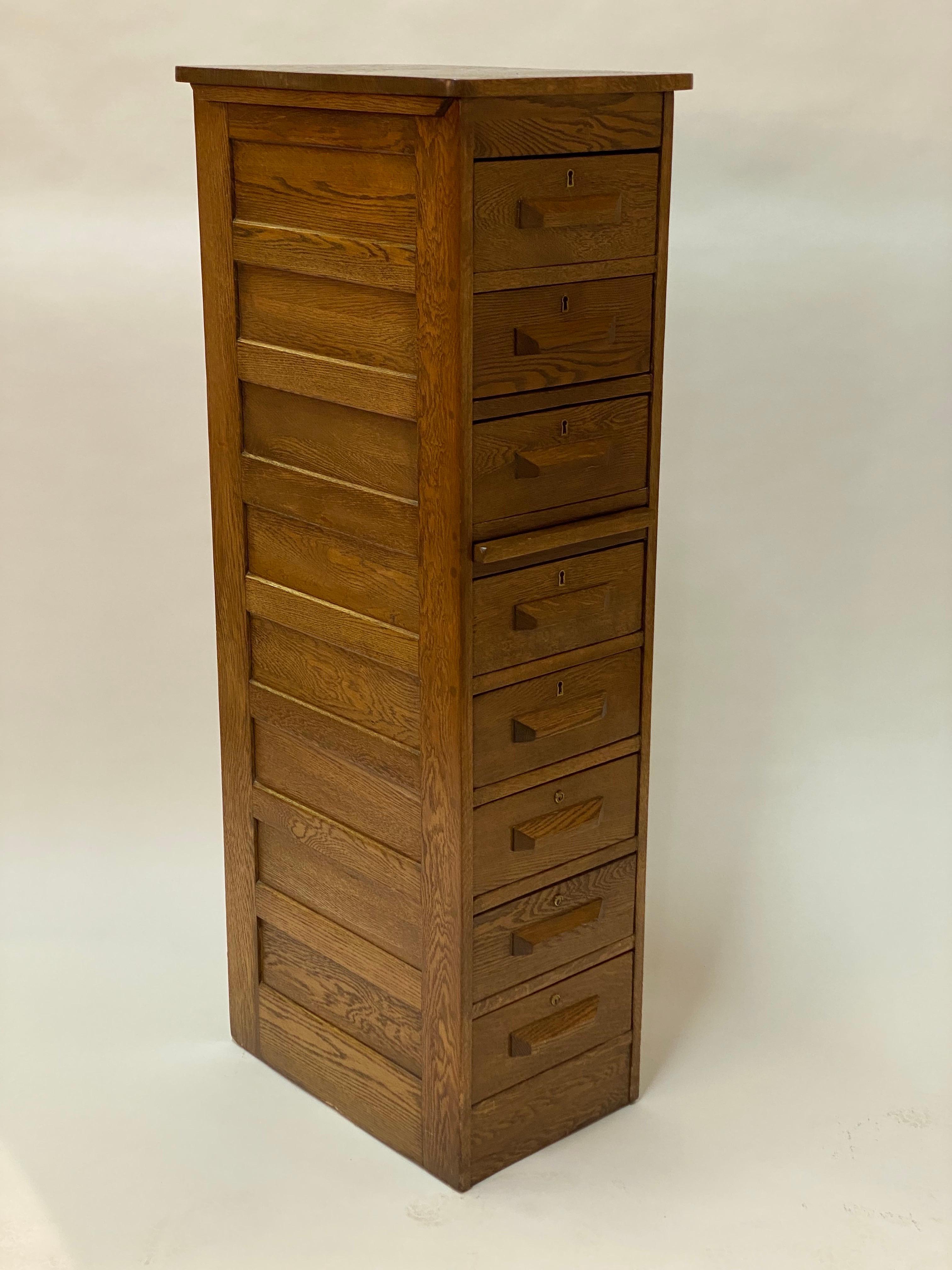 Tall 1920s Industrial Oak Eight Drawer Cabinet In Good Condition For Sale In Garnerville, NY
