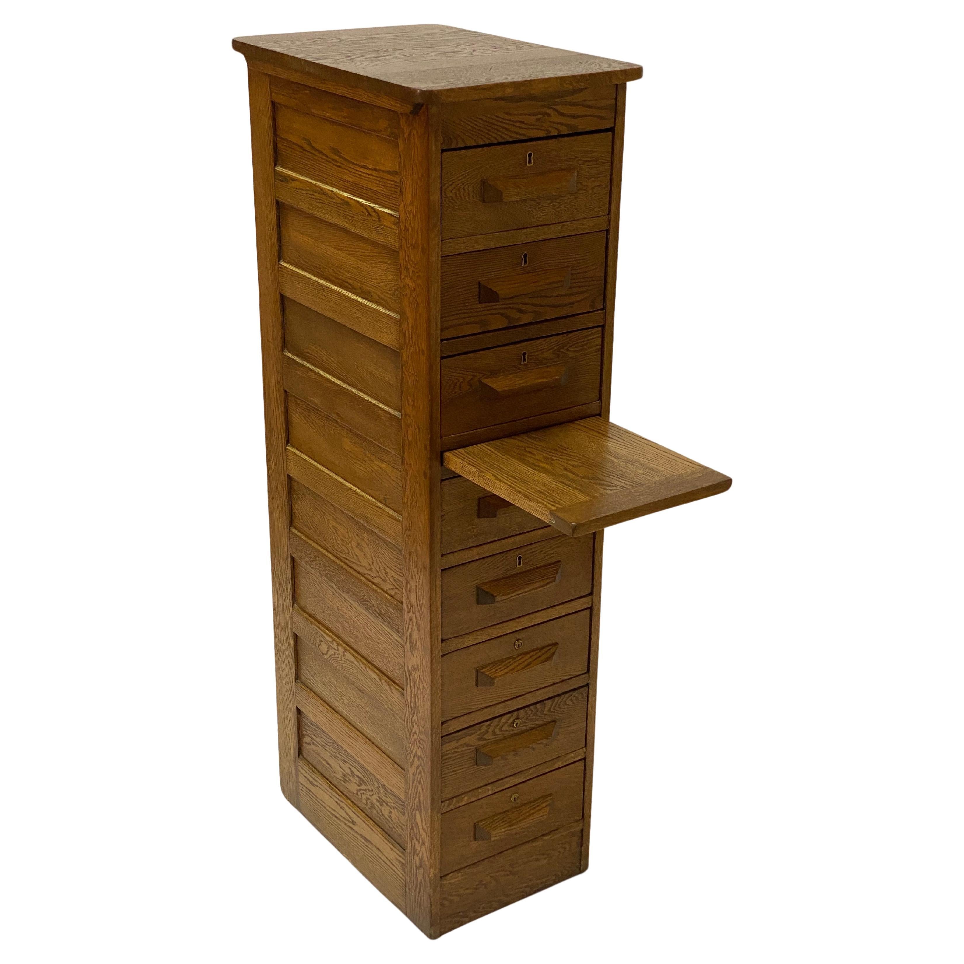 Tall 1920s Industrial Oak Eight Drawer Cabinet For Sale