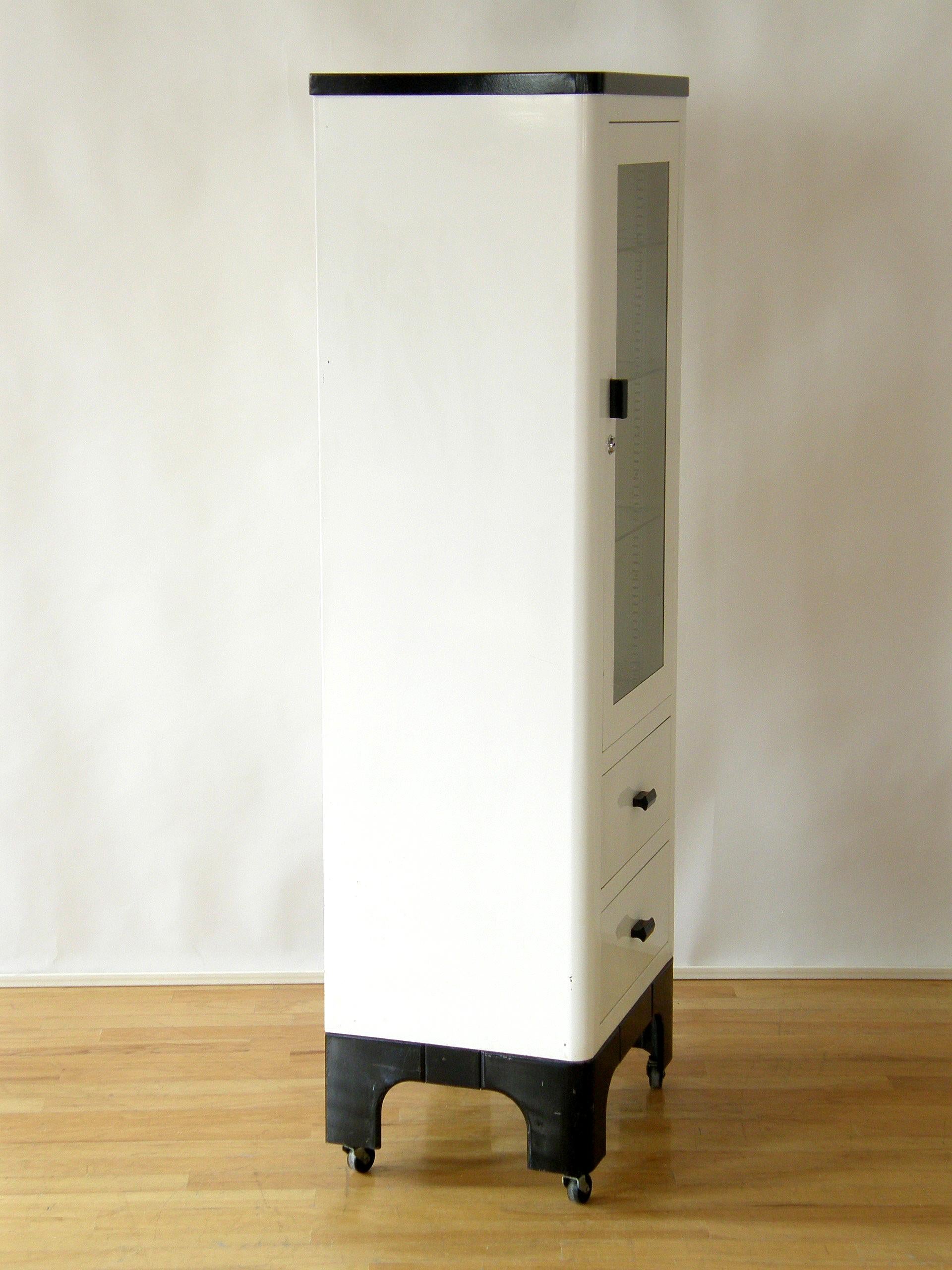 tall black cabinet with doors