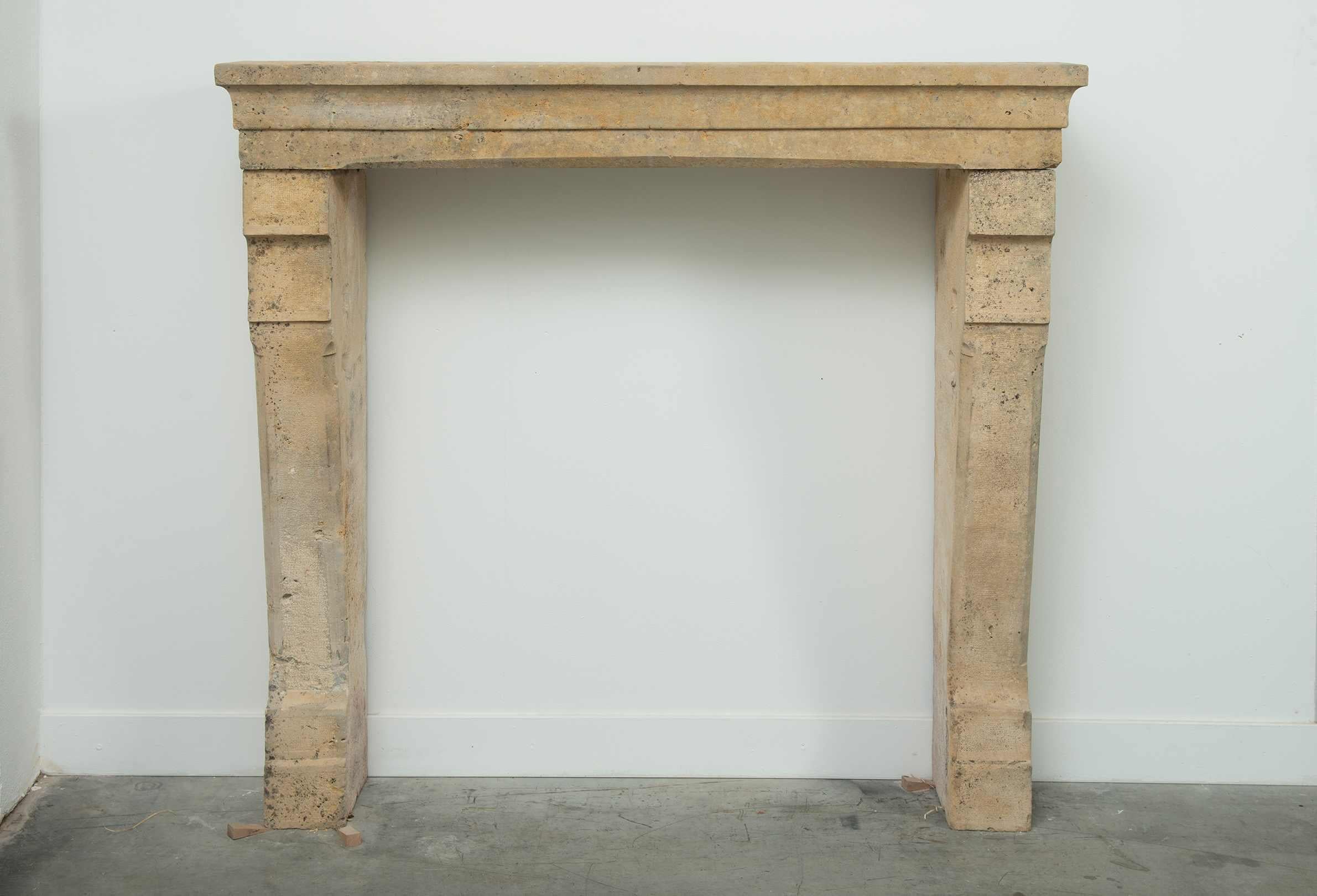 Tall 19th Century French Limestone Fireplace Mantel – Elegant & Robust In Good Condition For Sale In Haarlem, Noord-Holland