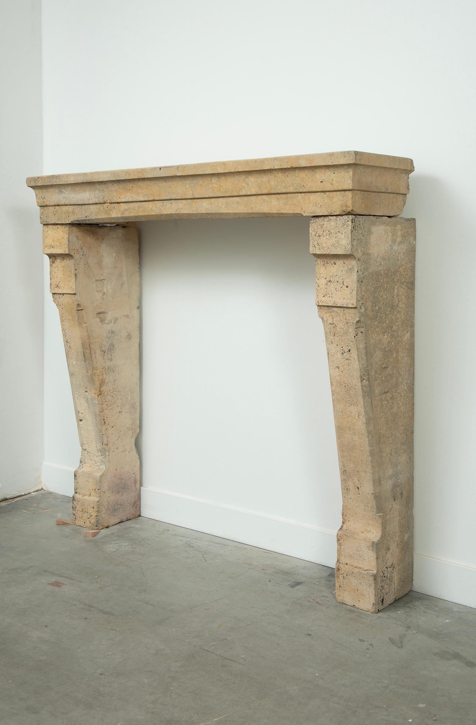 Stone Tall 19th Century French Limestone Fireplace Mantel – Elegant & Robust For Sale