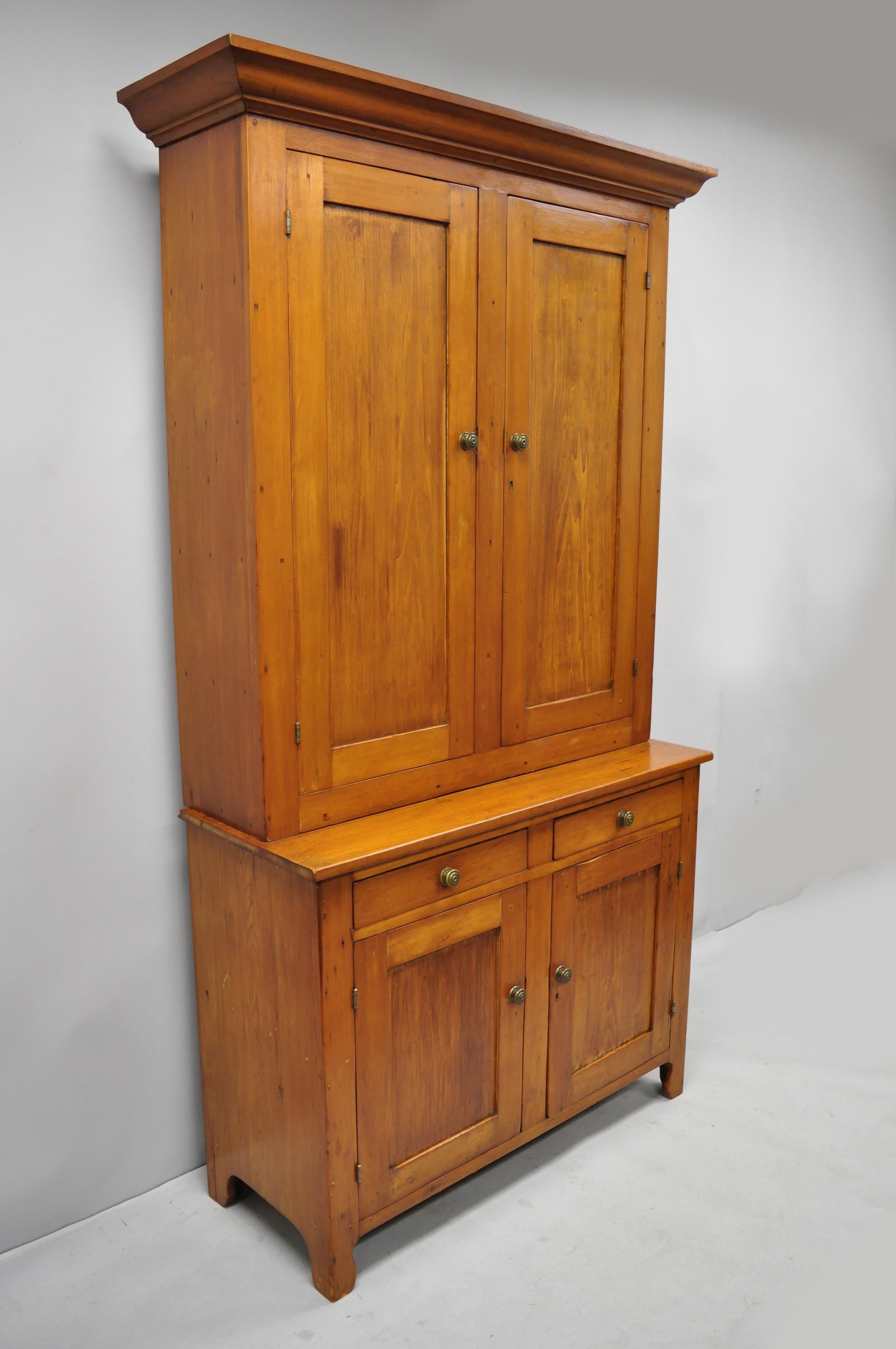 Tall 19th century pine wood blind doors step back cupboard hutch cabinet. Listing includes blue painted interior, solid wood construction, beautiful wood grain, 2 part construction, 4 swing doors, 2 dovetailed drawers, solid brass hardware, very