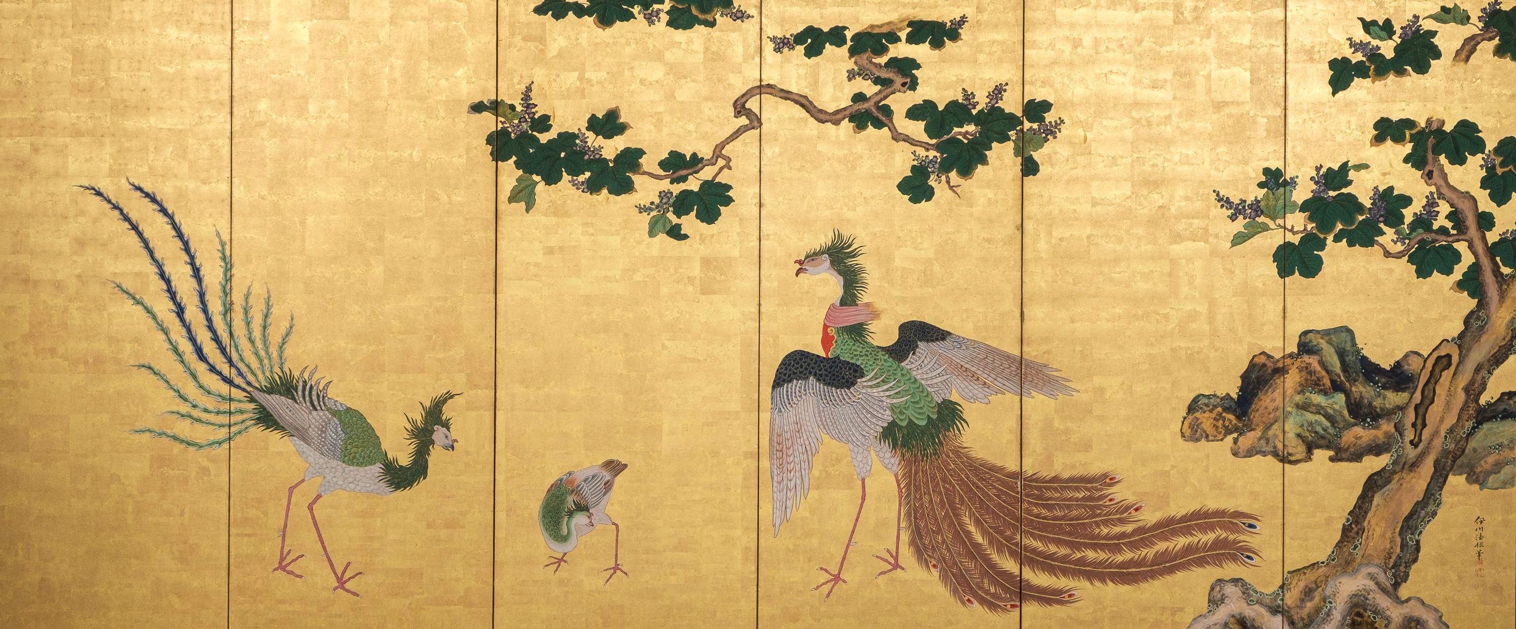 A superb, tall six-panel byôbu (folding screen) featuring a painting attributed to Kanô Isen’in Naganobu (1775–1828) depicting a family of phoenixes (hô’ô) gathered beneath the sheltering branches of a paulownia tree 桐 (kiri) in bloom.

The central
