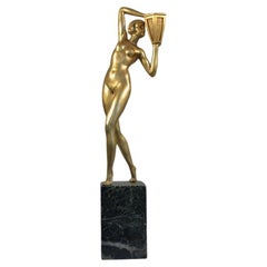 Tall 62cm art deco bronze lady holding a jar. Probably P.  Le Faguays