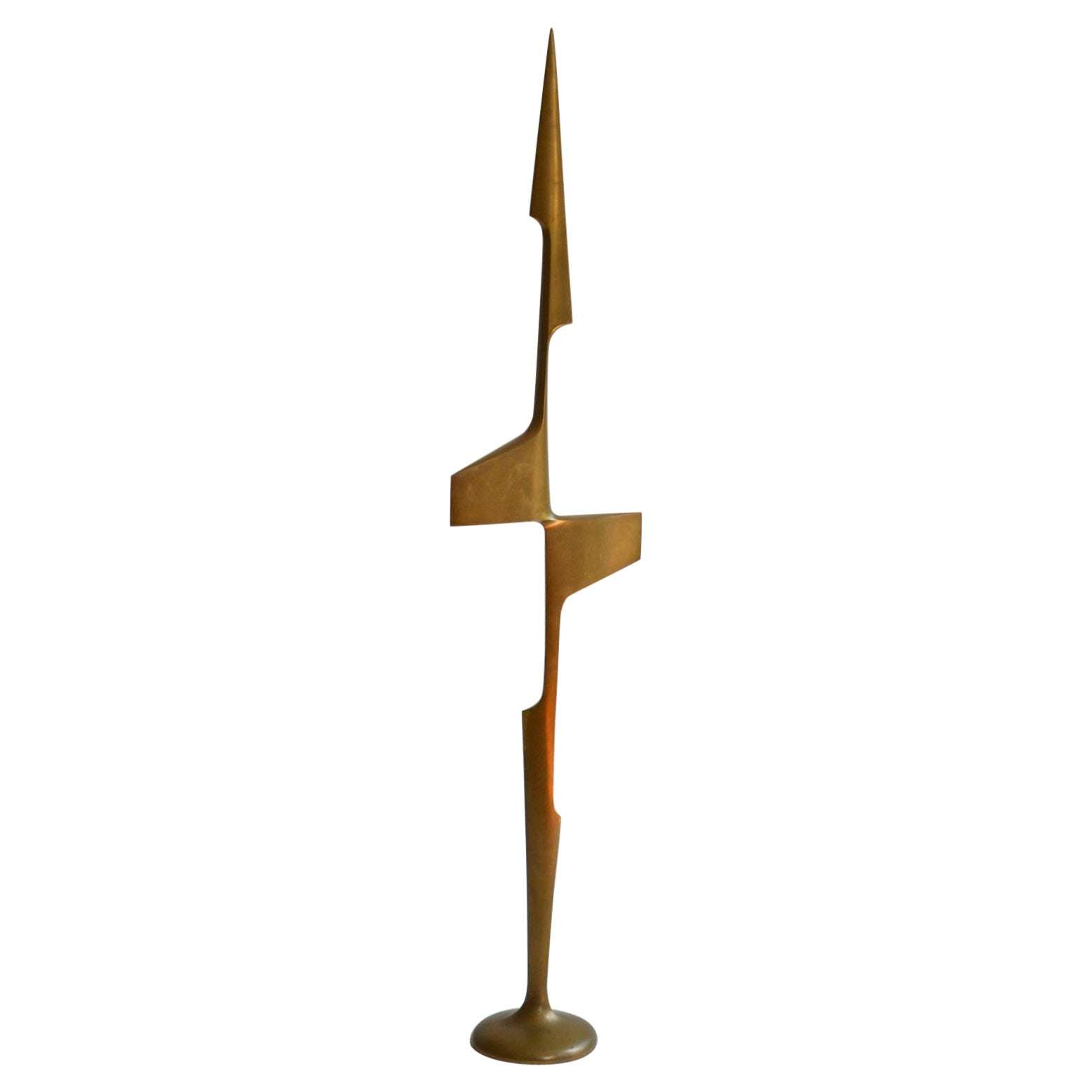 Tall abstract cast bronze sculpture sands proud in take-off to create the lift for an upward jump. The aerodynamic form gives the impression of sphere around the gleaming gold surface of this abstract expression, Dutch 1970's. It is part of a group