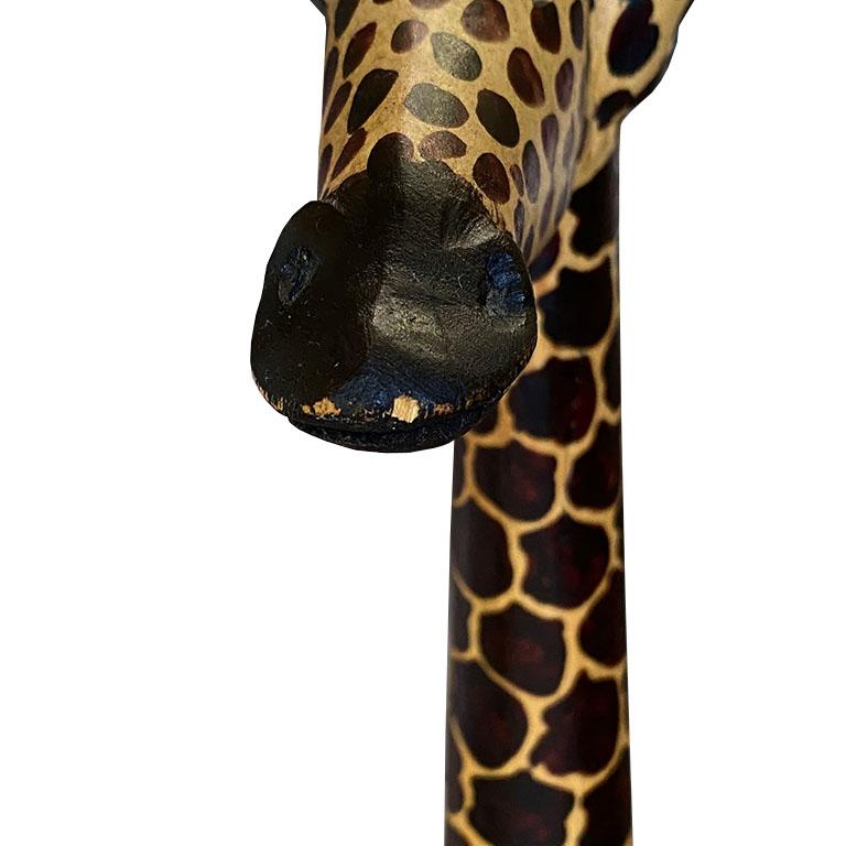 african wooden giraffe statue