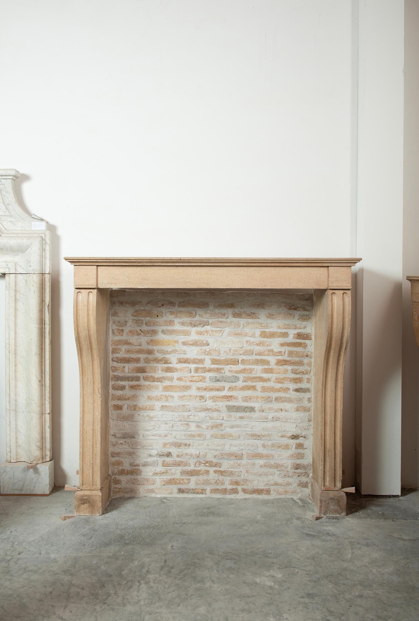Tall and Elegant Antique Limestone Fireplace mantel.

Nice and tall robust French country fireplace mantel in Burgundy limestone.
It’s nice proportions make is very suitable for an outdoor fireplace or large living areas. It simple lines and style