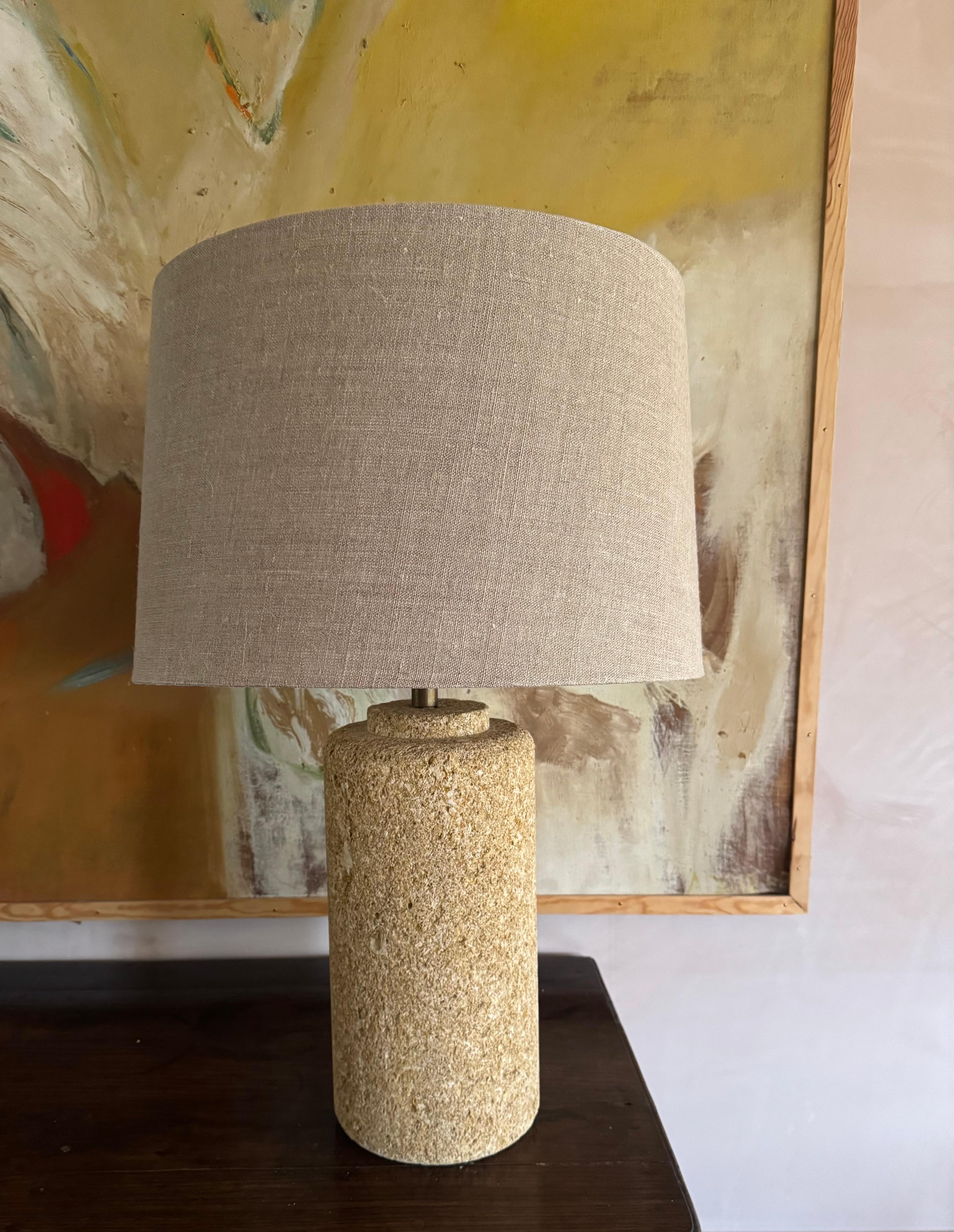 A fabulous tall and heavy gard stone lamp style of Albert Tormos. Photo of old flex showing, now rewired. Statement piece. Measurement to top of shade is76cm.