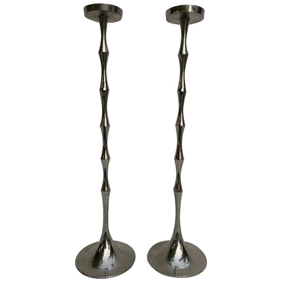 Tall and Sculptural Candleholders in Stanless Steel For Sale