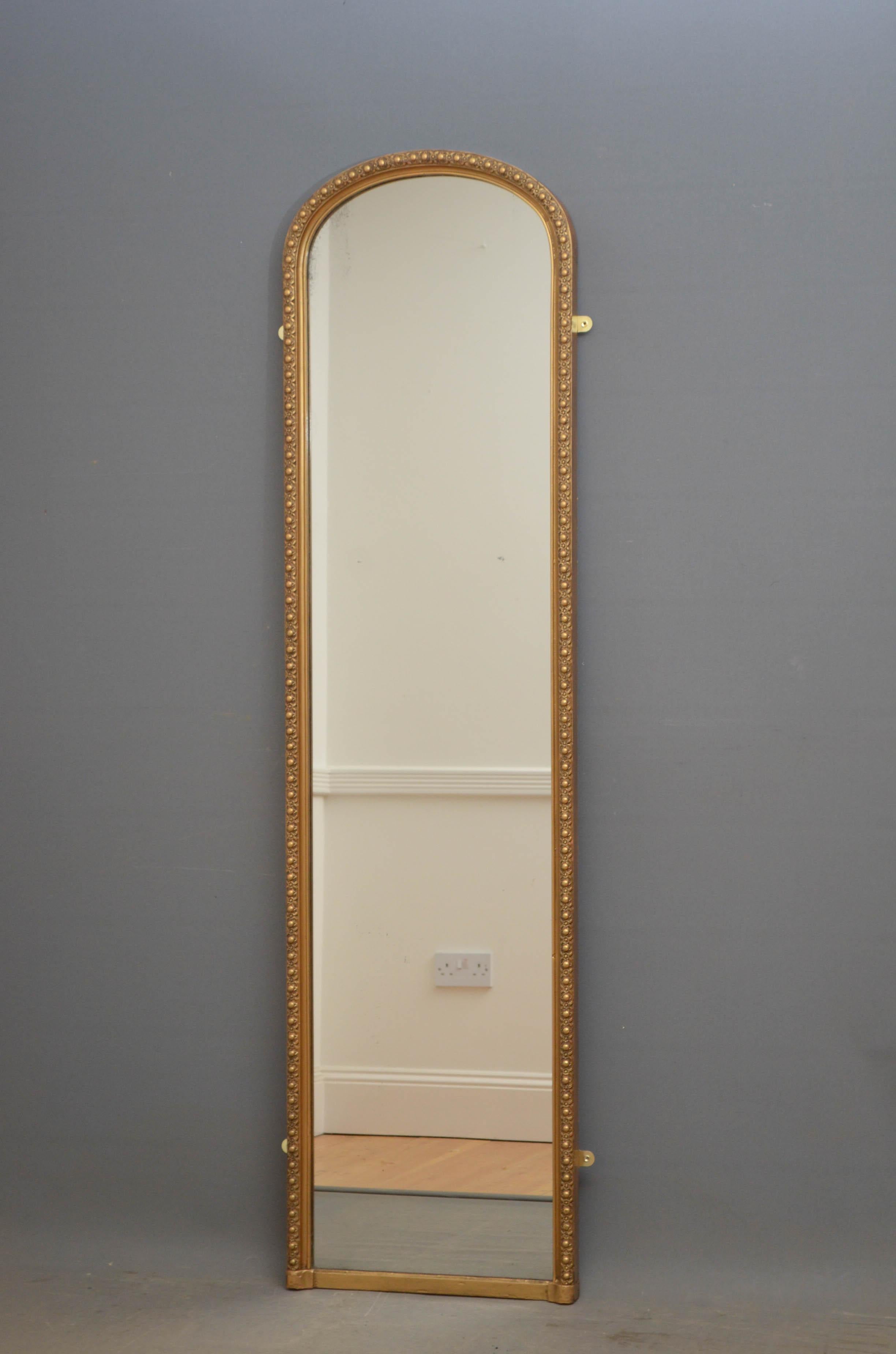 Sn4778, tall and slim Victorian pier mirror or floor standing mirror, having original foxed glass in finely decorated refinished frame. This antique mirror is in excellent home ready condition, circa 1870
Measures: H 74 1/4