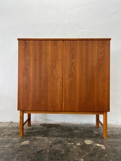 Tall and wide Mid Century Danish Modern Teak cabinet. so much storage. Beautiful