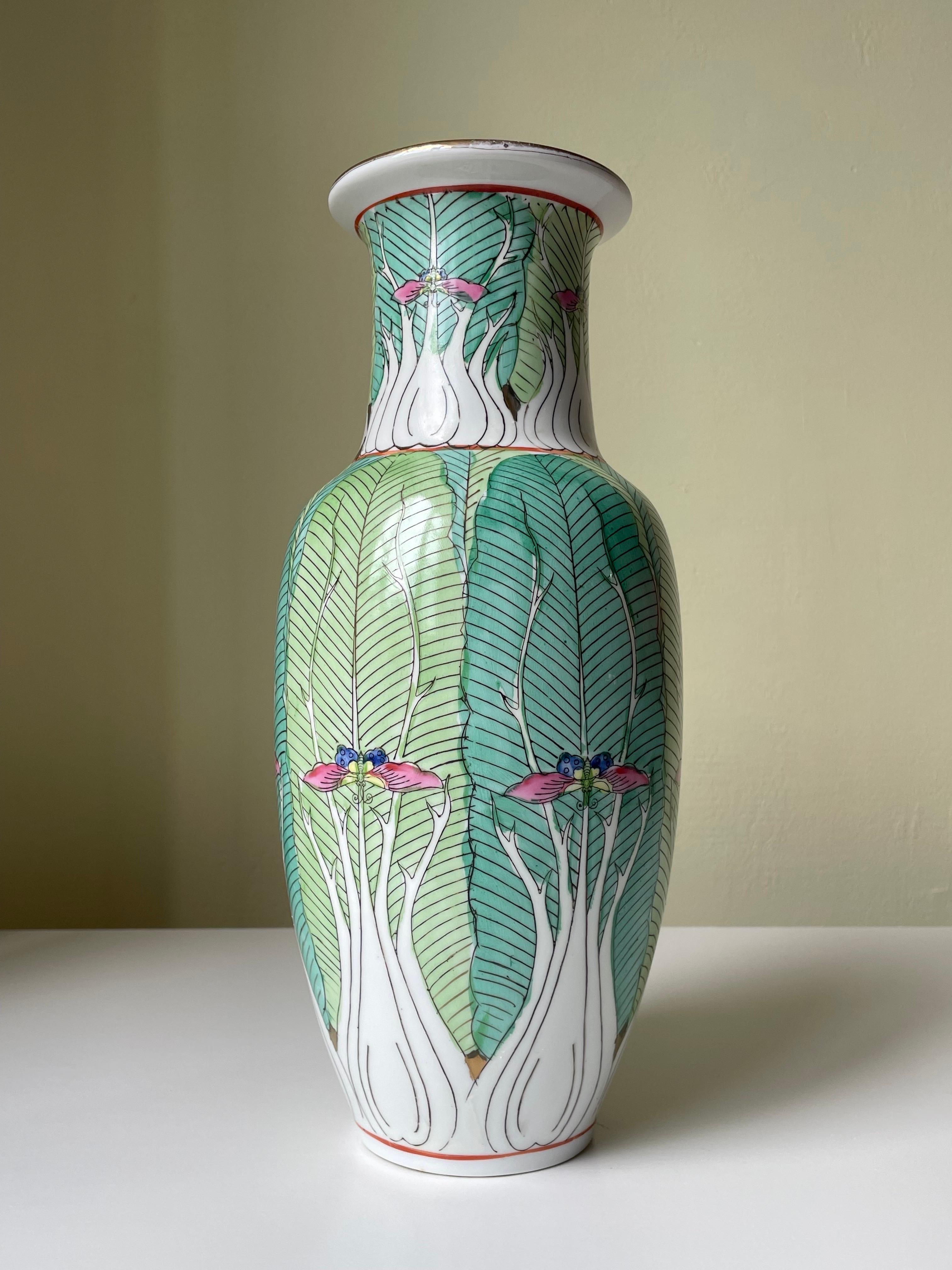 Large antique Chinese porcelain vase decorated with green, white and pink organic motifs with golden accents. Stylized art nouveau decorations of branches, leaves, roots and butterflies. Manufactured between 1890 and 1920 - possibly Famille Verte.