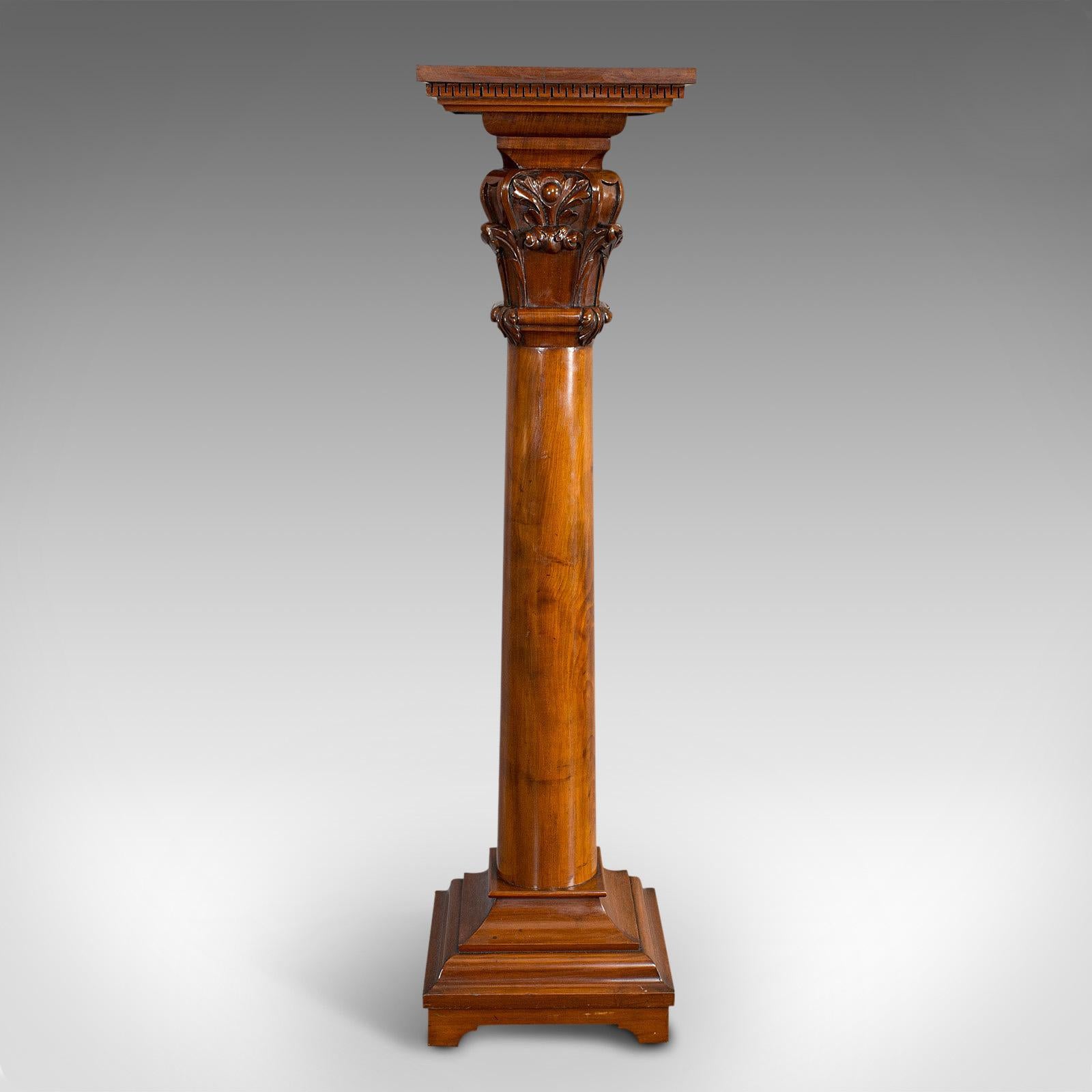 This is a tall antique display pedestal. An English, mahogany torchere or plant stand, dating to the Regency period, circa 1820 and later.

An attractive Regency display stand
Displays a desirable aged patina
Select mahogany shows fine grain
