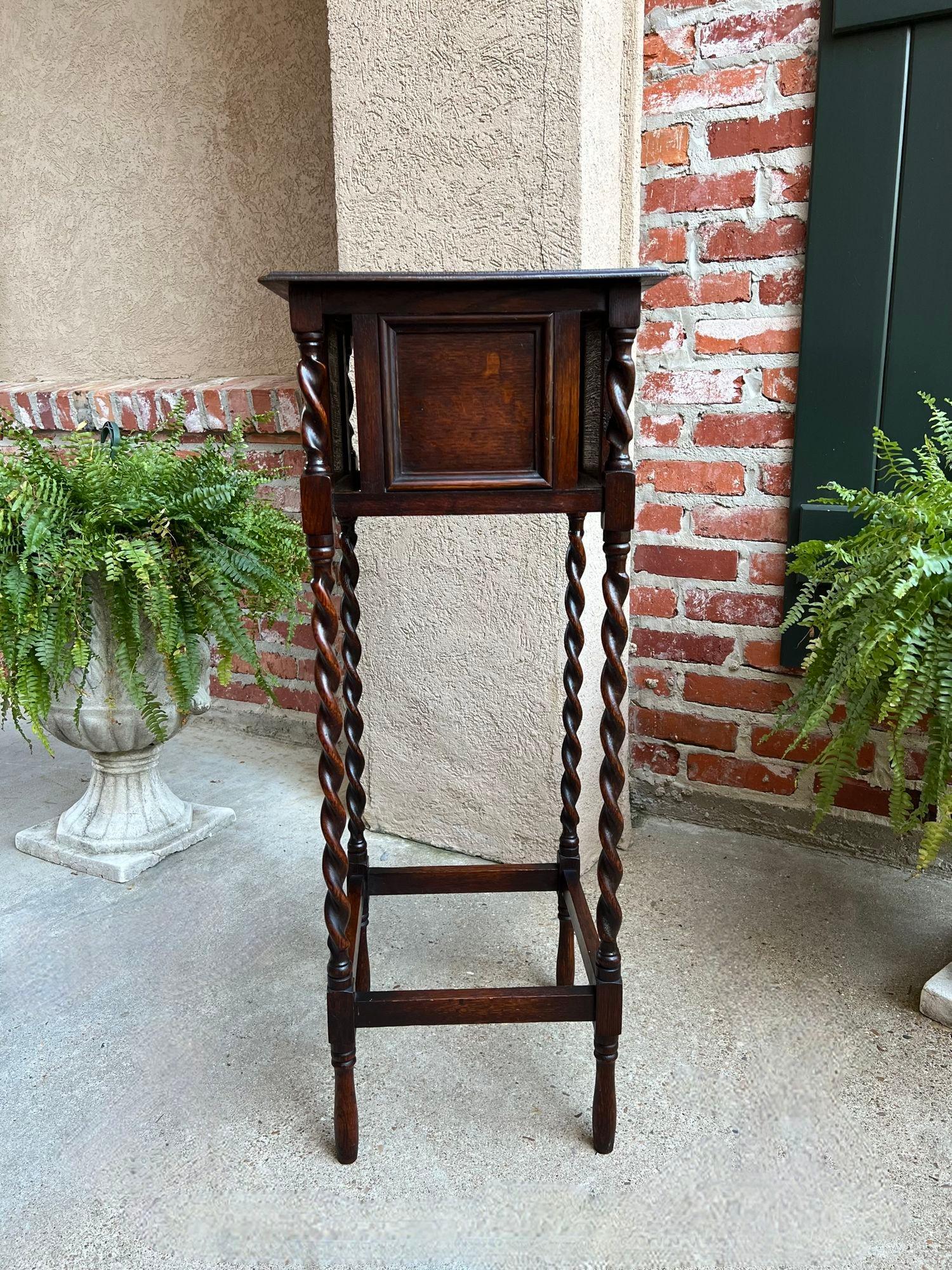 Tall Antique English Barley Twist Plant Stand Square Display Table Tiger Oak.

Direct from England, a very tall and beautiful antique English display stand, perfect for everything from plants to bronze statues!!
The intriguing design features an
