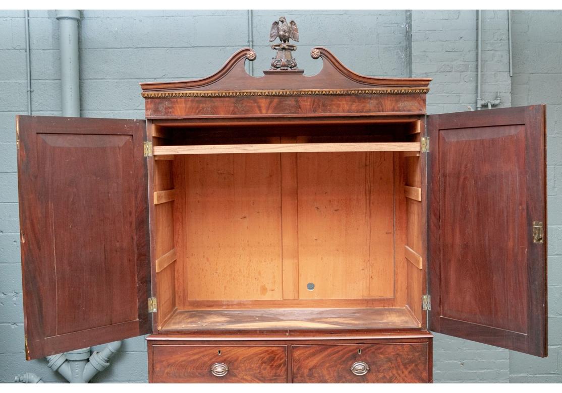 Carved Tall Antique Figured Mahogany Linen Press For Sale