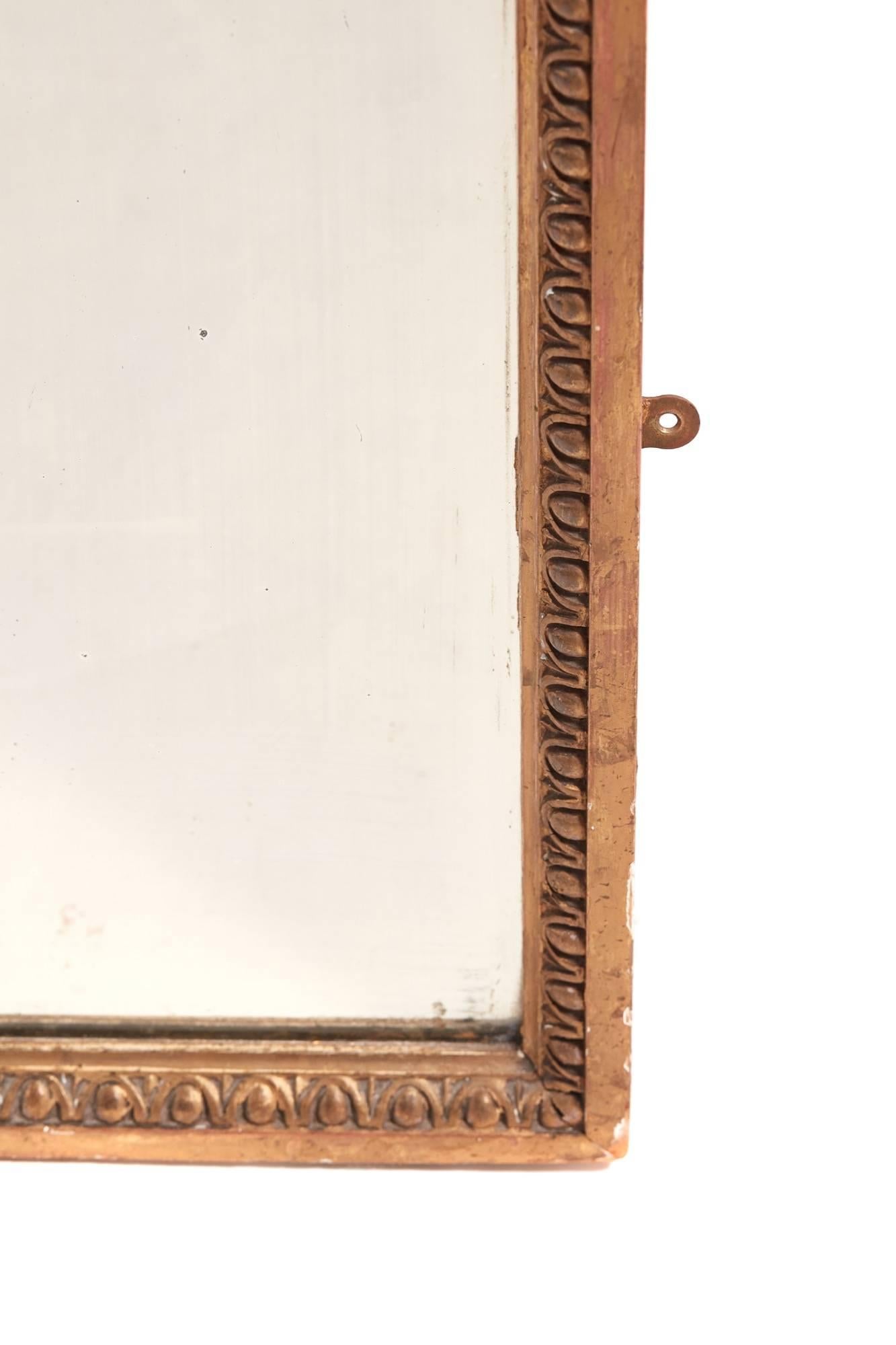 Tall antique gilt pier mirror with a swan neck pediment, original mirror plate.