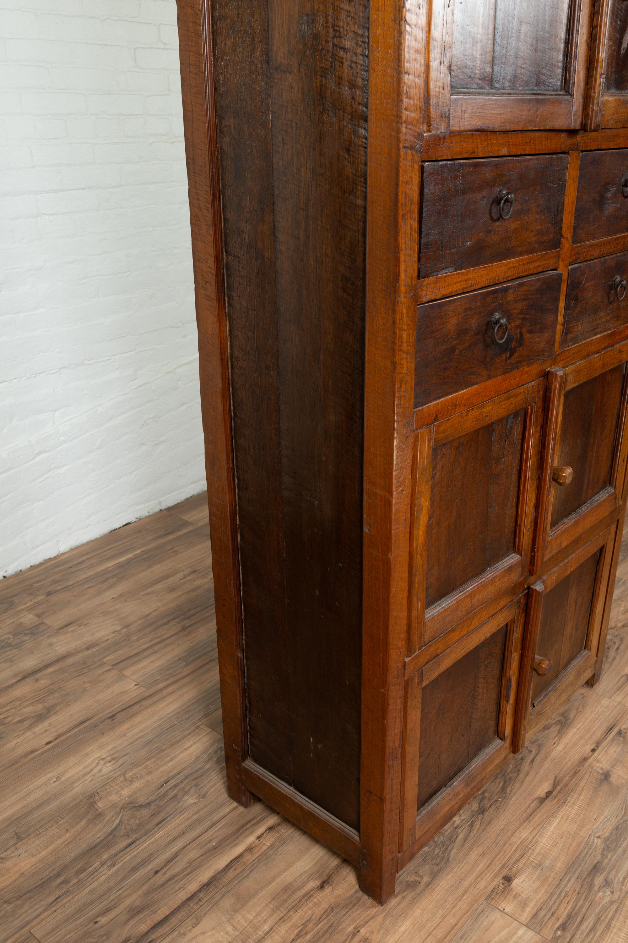 Tall Antique Javanese Teak Wood Cabinet with Four Double Doors and Drawers 8