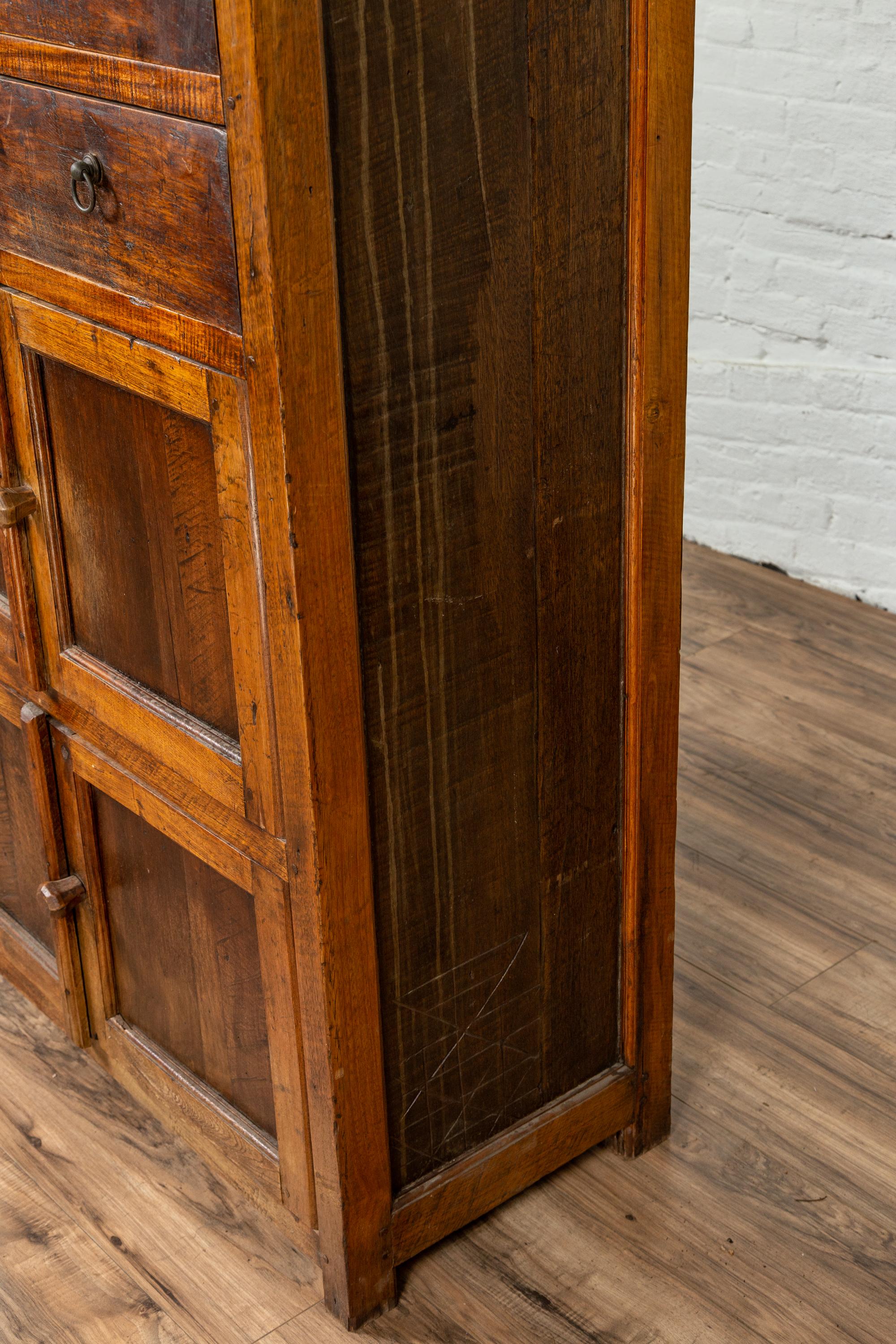 Tall Antique Javanese Teak Wood Cabinet with Four Double Doors and Drawers 11