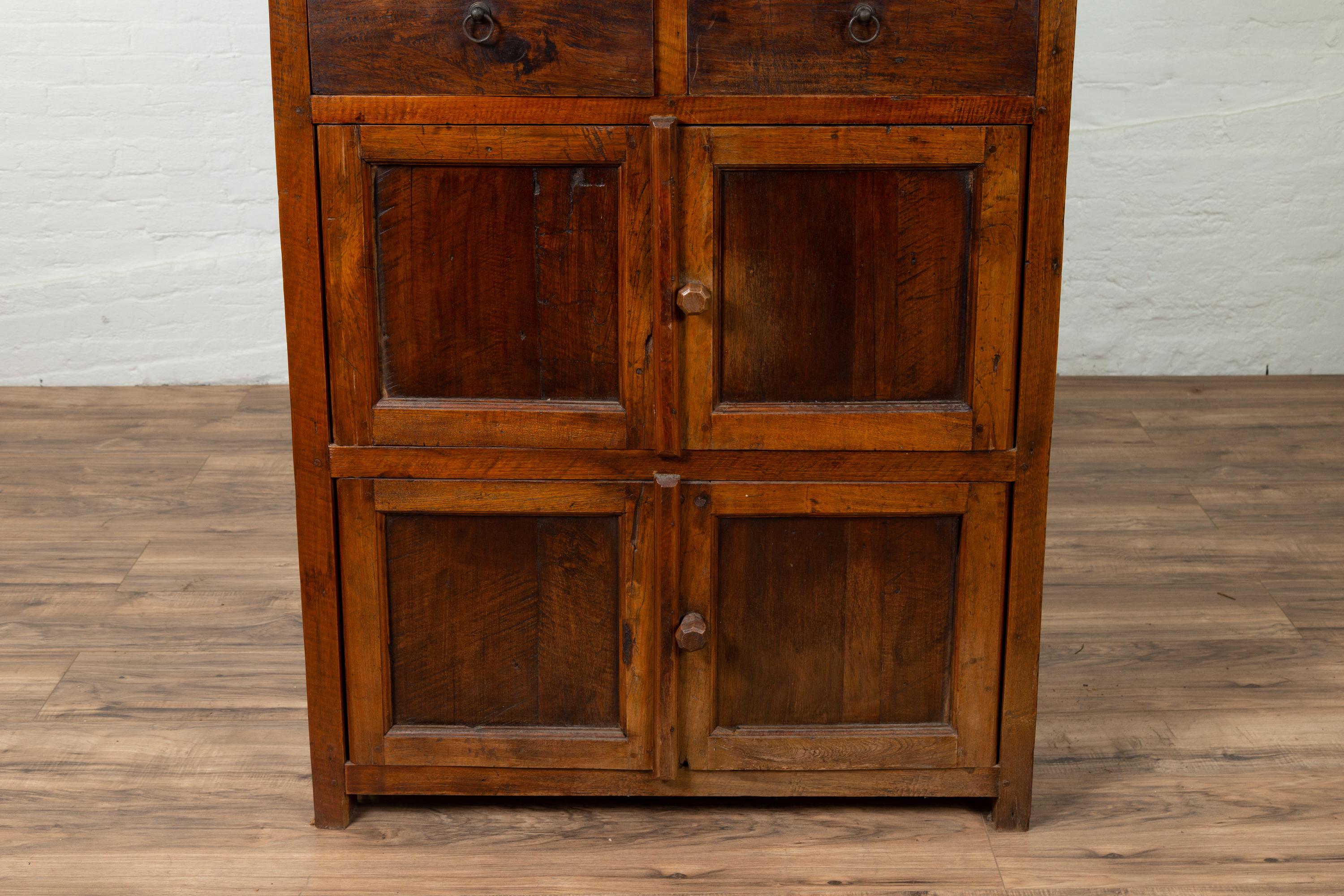 Tall Antique Javanese Teak Wood Cabinet with Four Double Doors and Drawers In Good Condition In Yonkers, NY