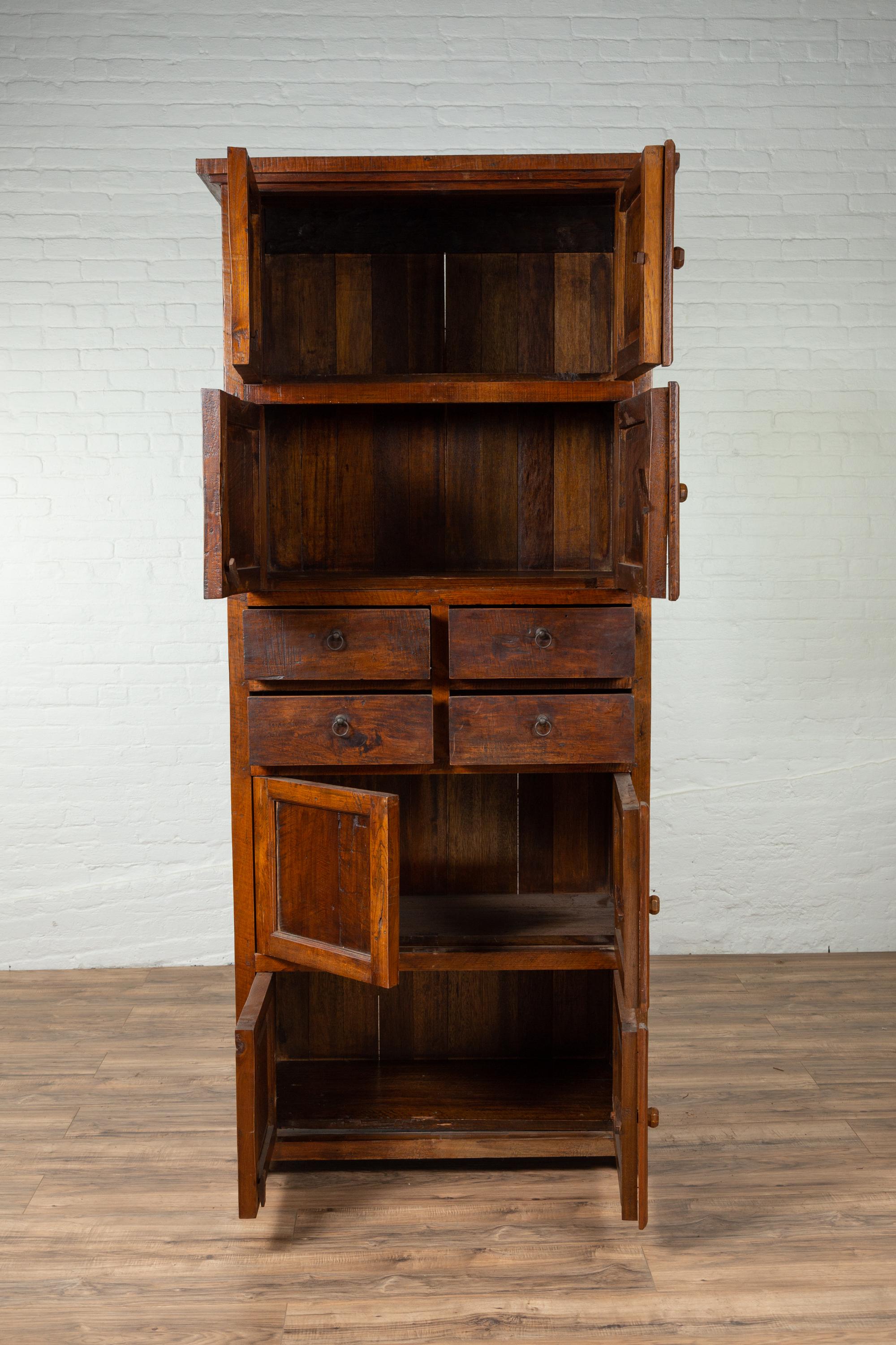 20th Century Tall Antique Javanese Teak Wood Cabinet with Four Double Doors and Drawers